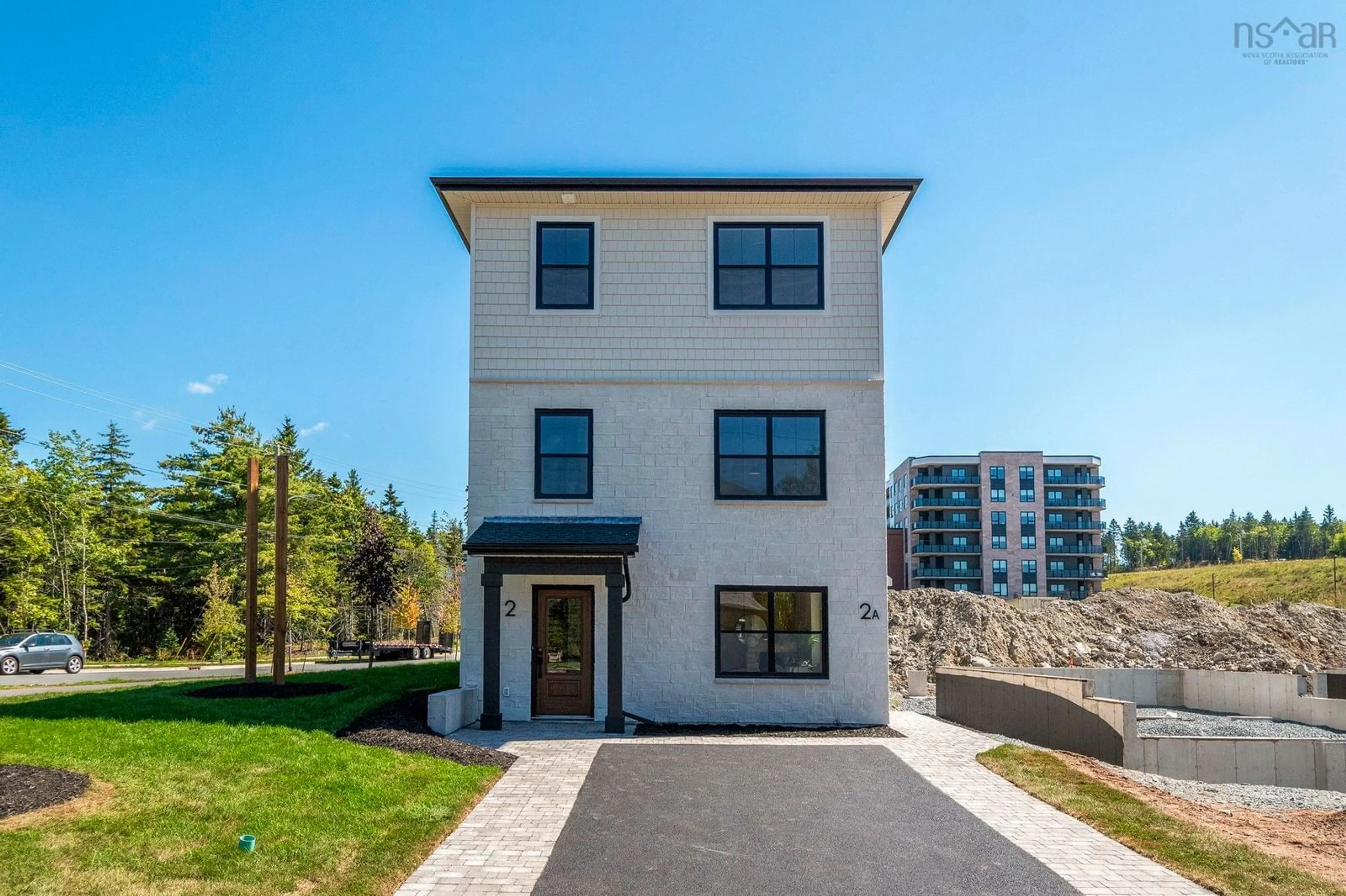 Home with brick exterior material, street for 2 Pearlgarden Close #PC-1, Dartmouth Nova Scotia B2X 0C2