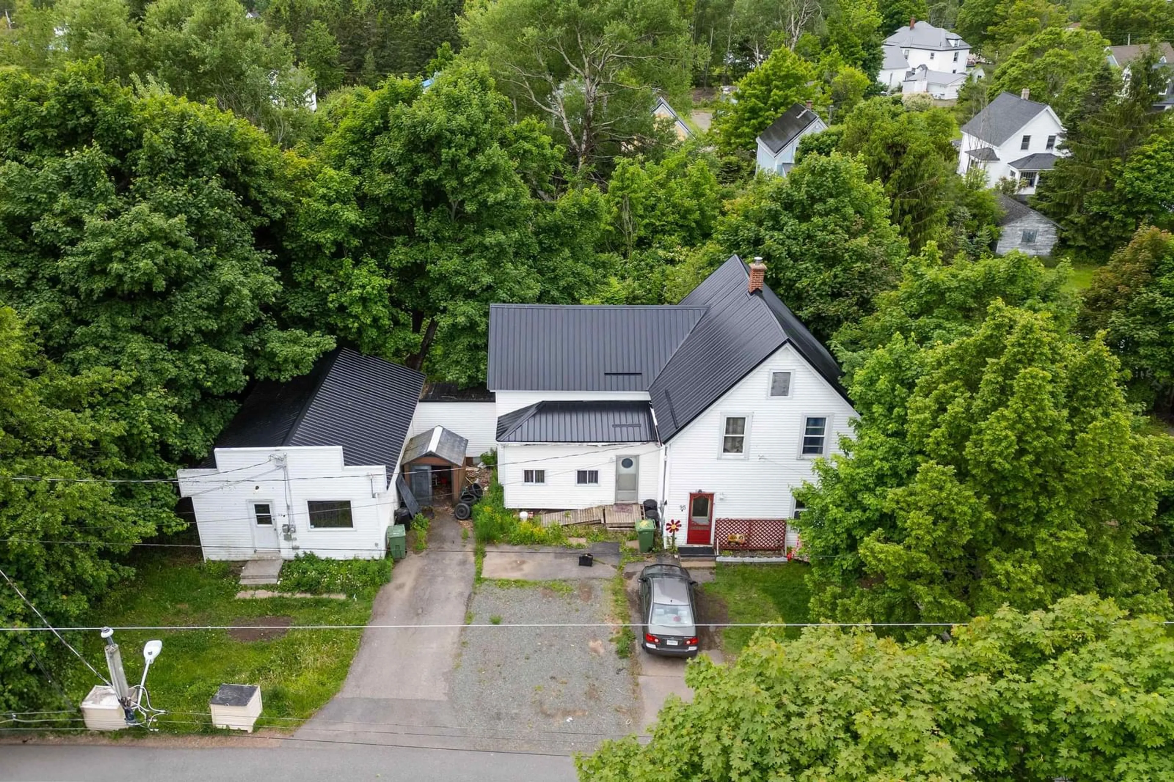 A pic from outside/outdoor area/front of a property/back of a property/a pic from drone, street for 95 Church St, Springhill Nova Scotia B0M 1X0