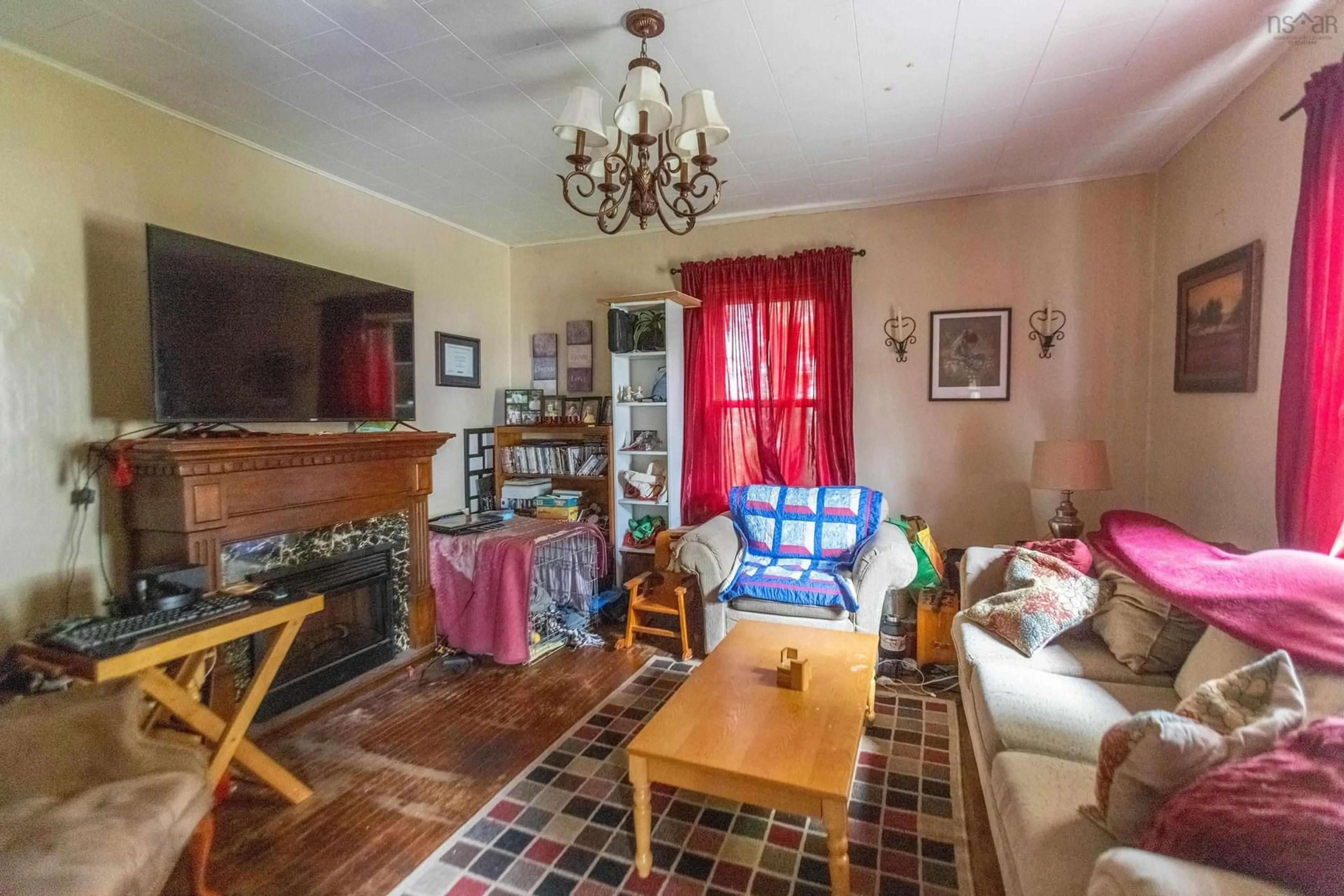 Living room with furniture, unknown for 95 Church St, Springhill Nova Scotia B0M 1X0