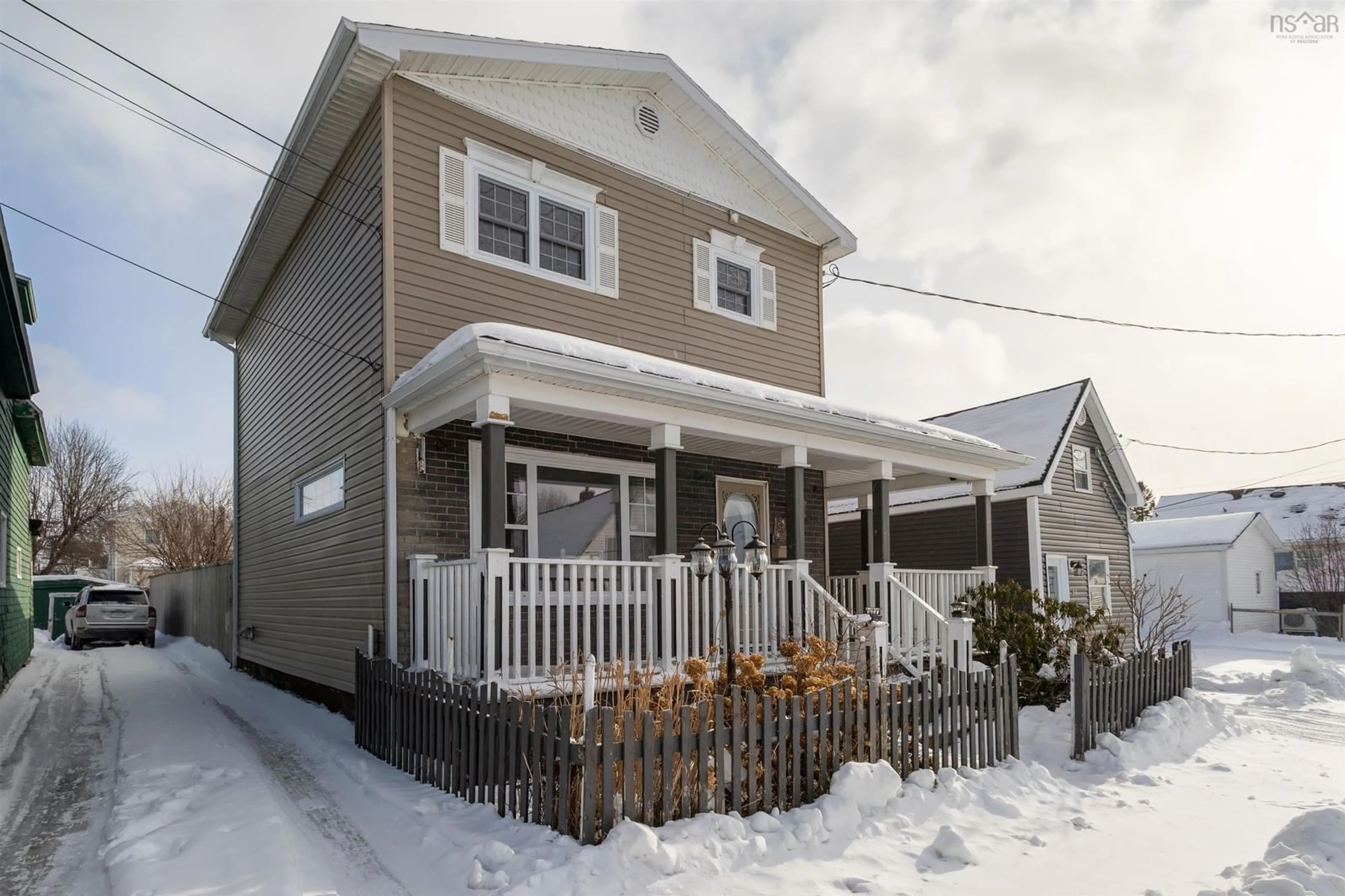 Home with vinyl exterior material, street for 53 Stanley St, North Sydney Nova Scotia B2A 1T8