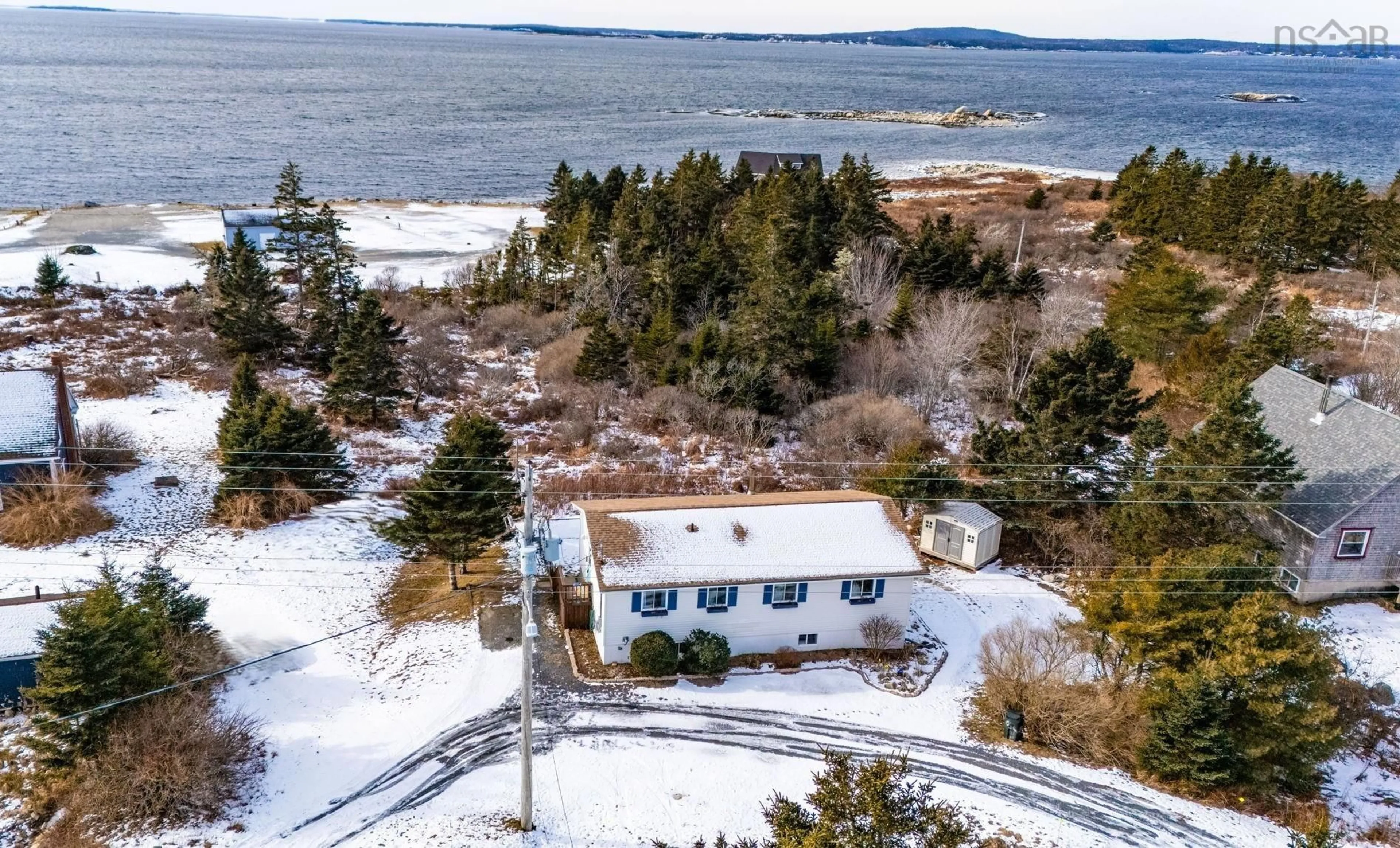 A pic from outside/outdoor area/front of a property/back of a property/a pic from drone, water/lake/river/ocean view for 8554 Peggys Cove Rd, Indian Harbour Nova Scotia B3Z 3P4
