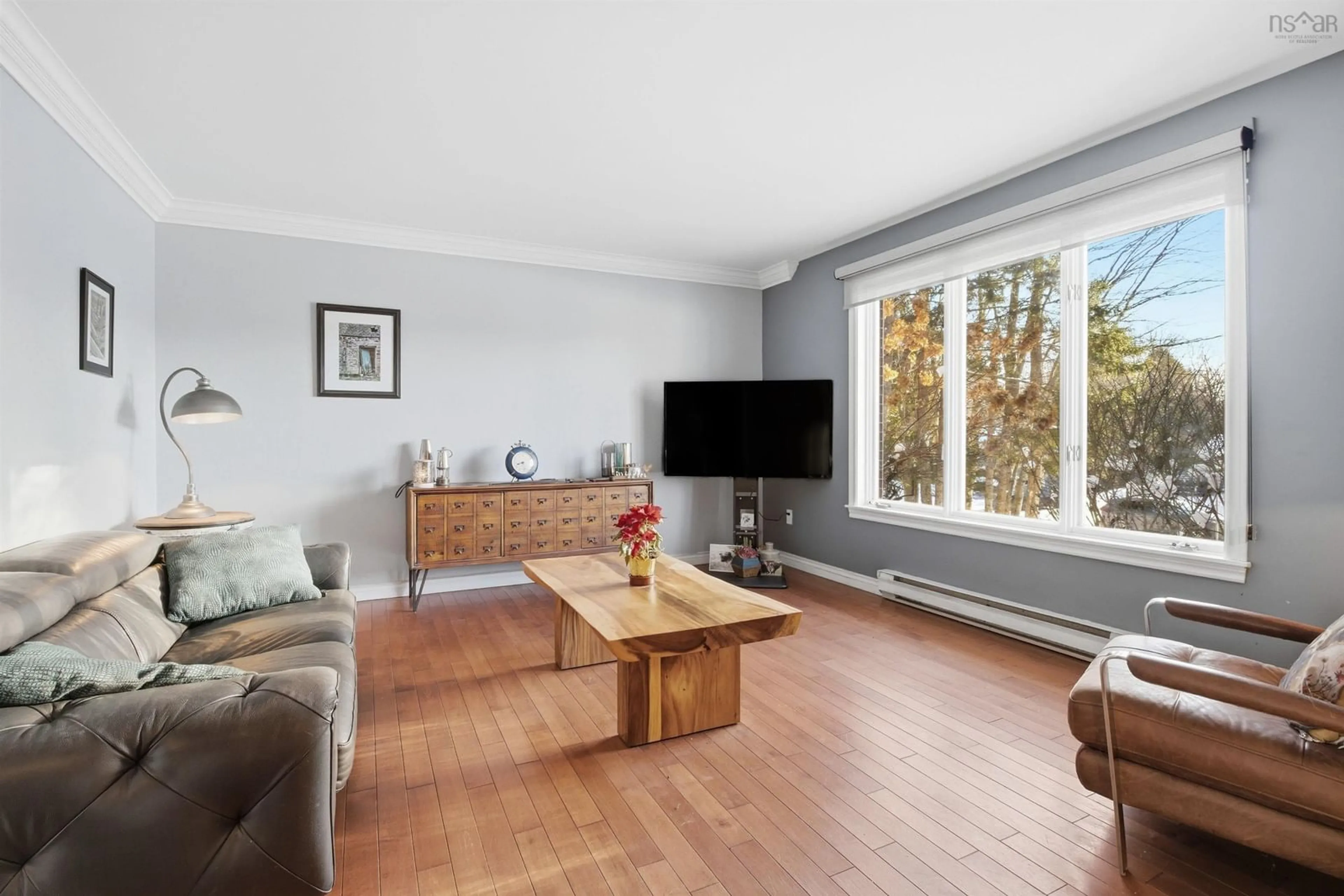 Living room with furniture, wood/laminate floor for 87 Saywood Dr, Bible Hill Nova Scotia B6L 4H1