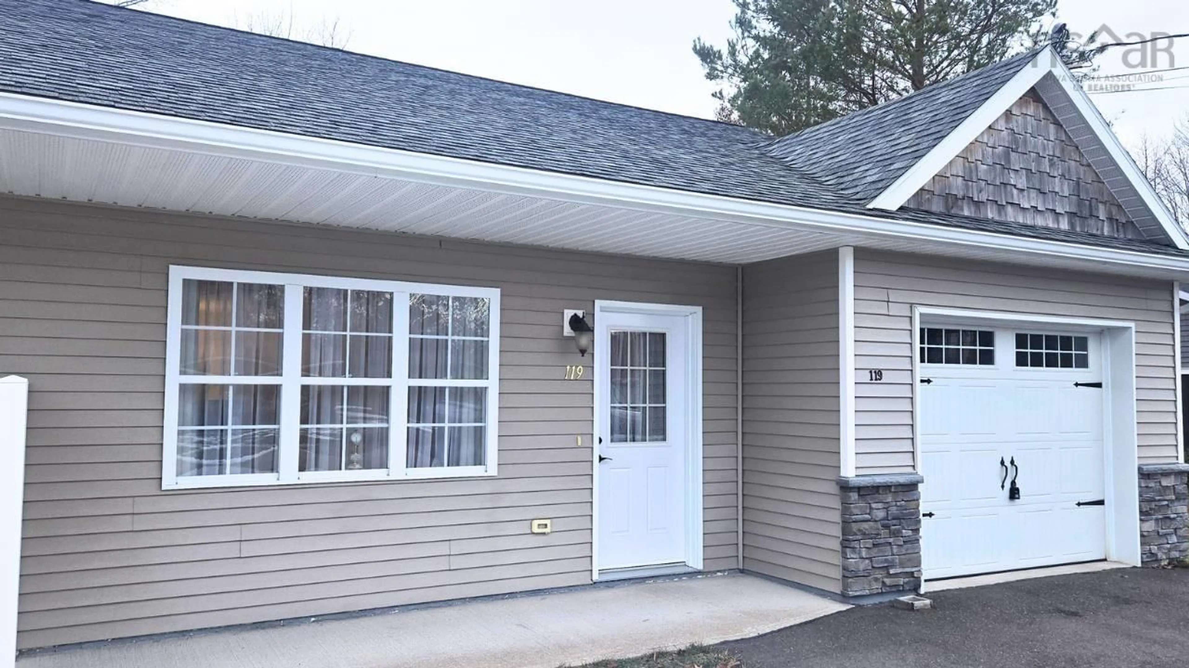 Home with vinyl exterior material, street for 119 Fairview Dr, Nictaux Nova Scotia B0S 1P0