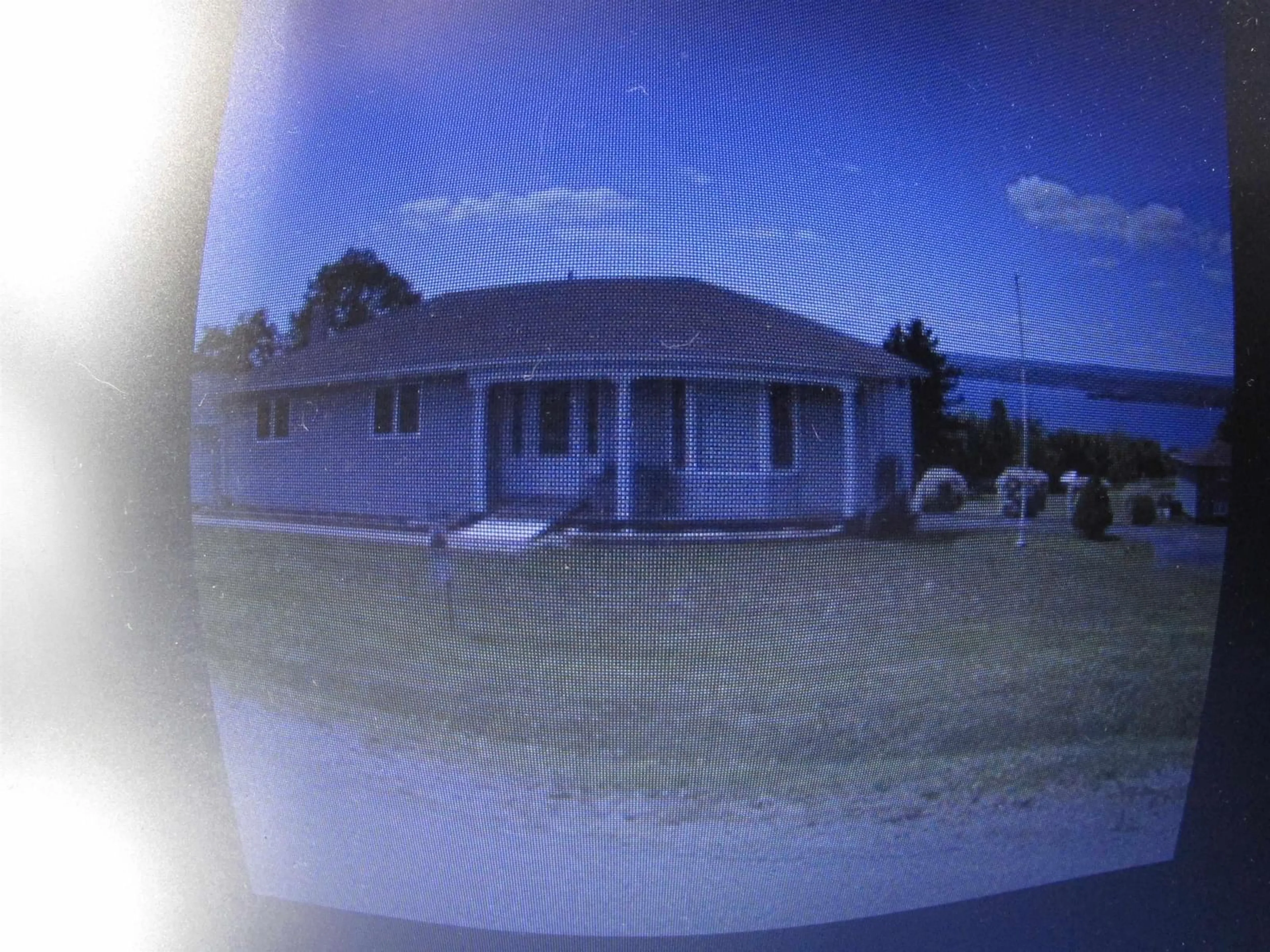 A pic from outside/outdoor area/front of a property/back of a property/a pic from drone, water/lake/river/ocean view for 25 Evelyns Ave, Georges River Nova Scotia B1Y 3G7