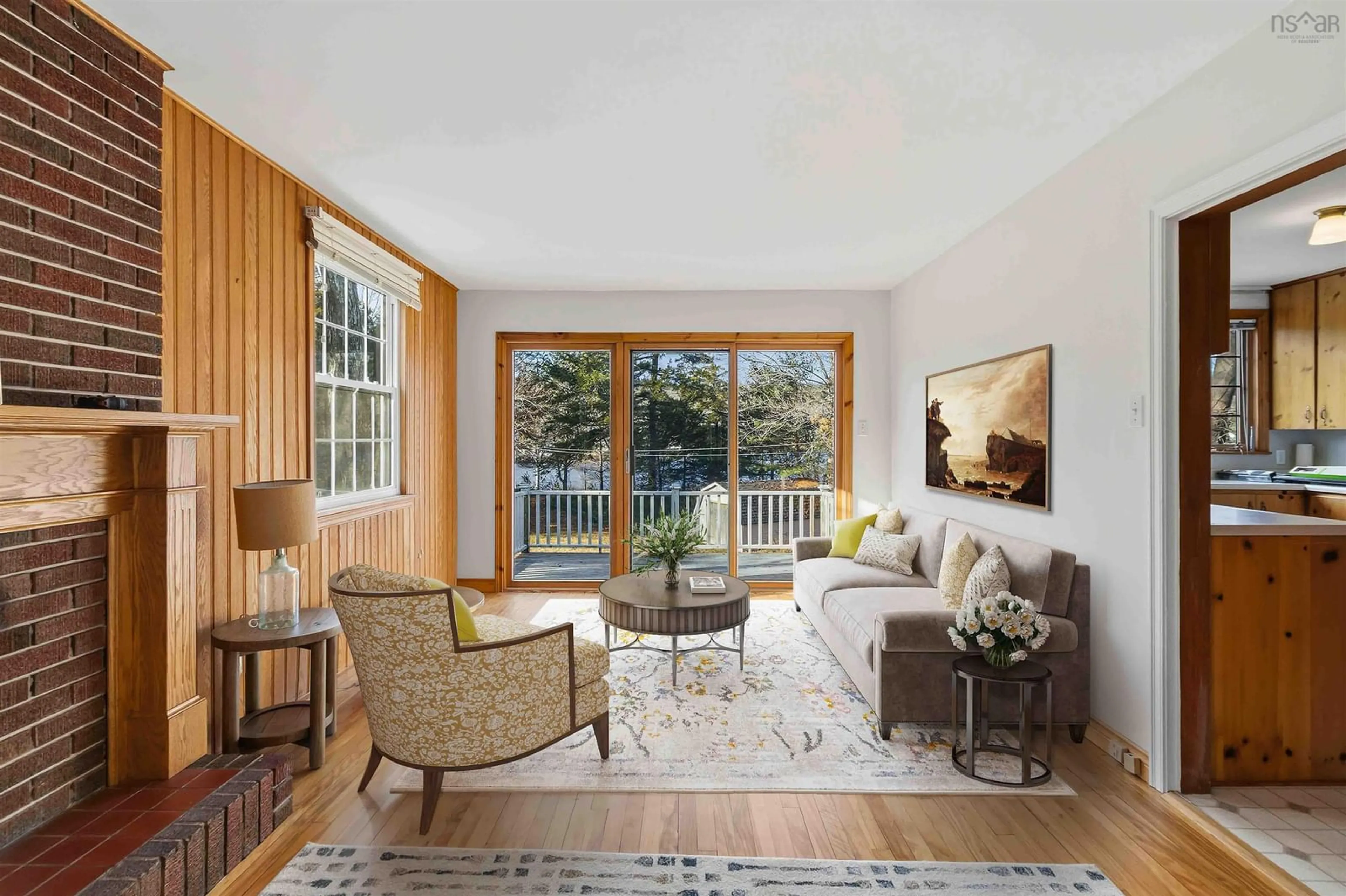 Living room with furniture, wood/laminate floor for 3577/3577A Highway 2 Hwy, Fletchers Lake Nova Scotia B2T 1H7