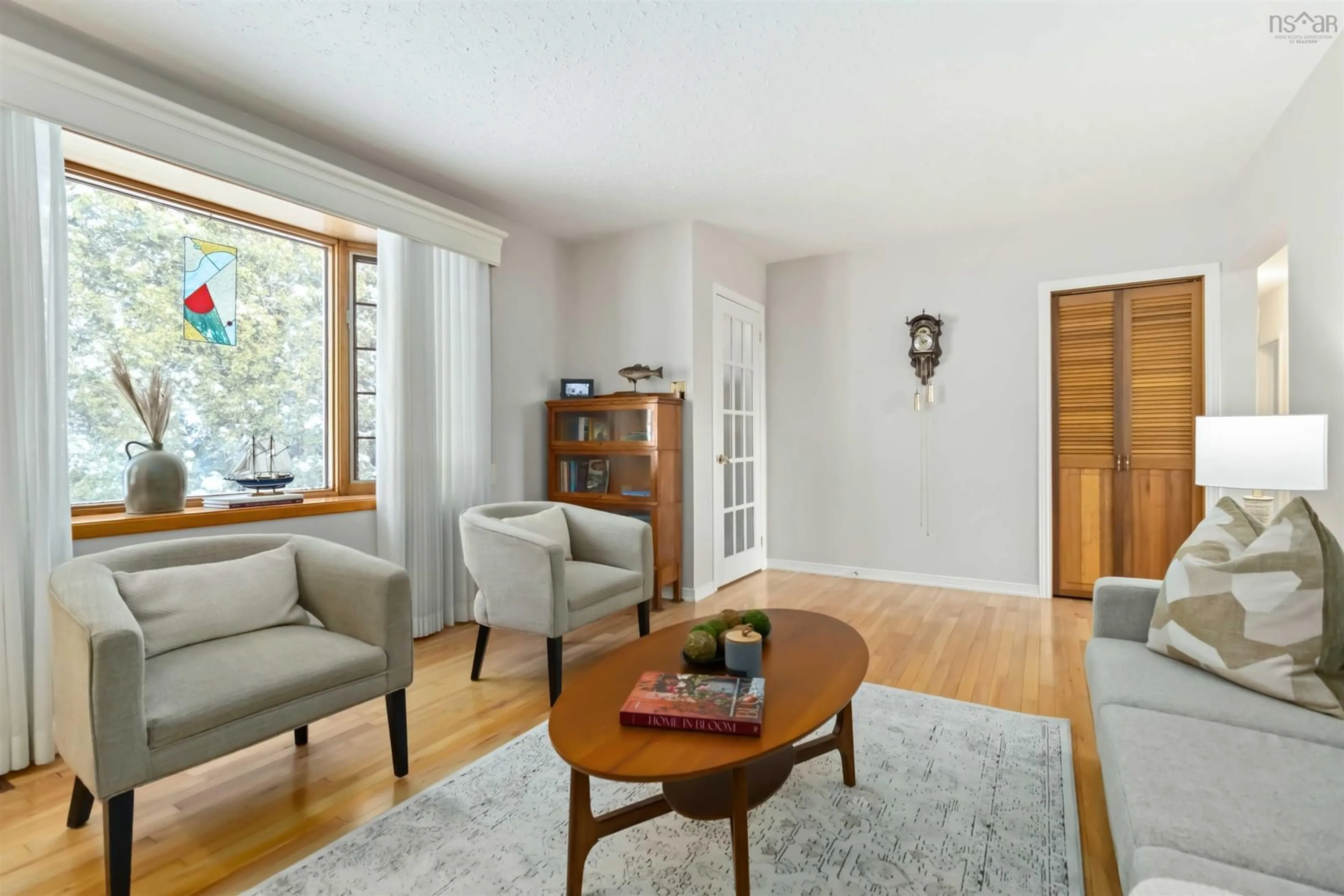 Living room with furniture, wood/laminate floor for 88 Beaumont Dr, Lower Sackville Nova Scotia B4C 1V6