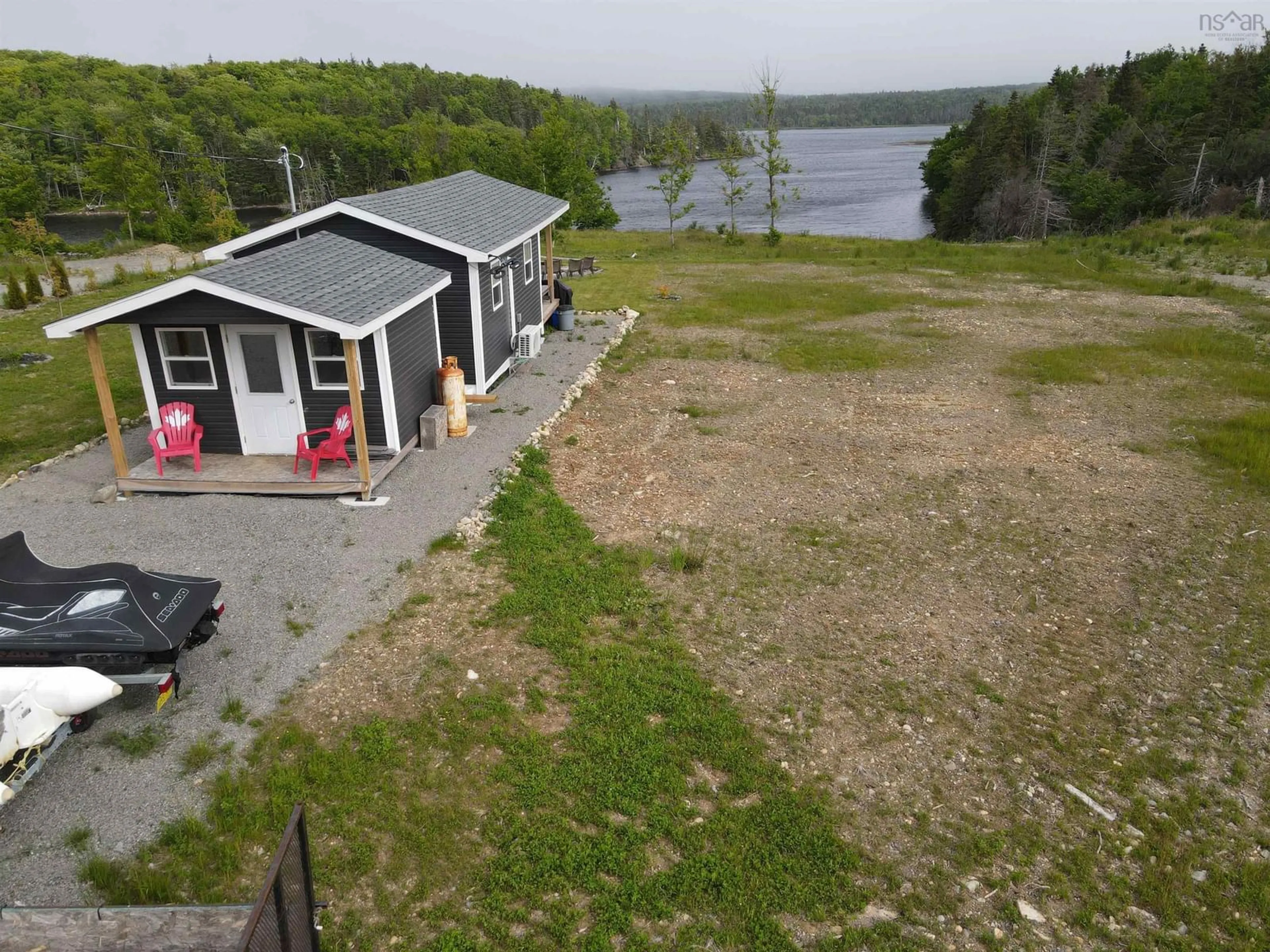 A pic from outside/outdoor area/front of a property/back of a property/a pic from drone, water/lake/river/ocean view for 202 Catalone Gut Rd, Catalone Nova Scotia B1C 2E5