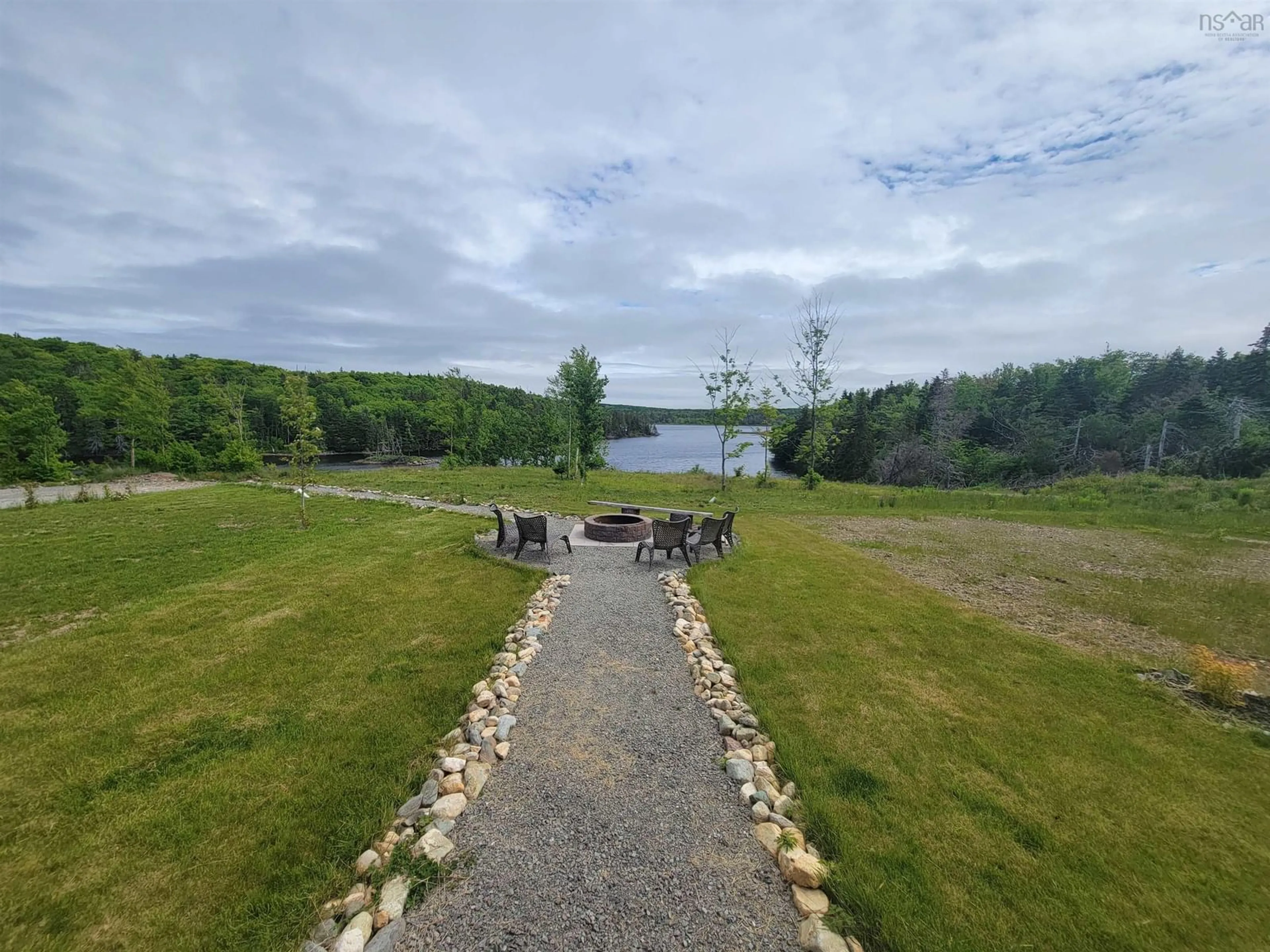 A pic from outside/outdoor area/front of a property/back of a property/a pic from drone, water/lake/river/ocean view for 202 Catalone Gut Rd, Catalone Nova Scotia B1C 2E5
