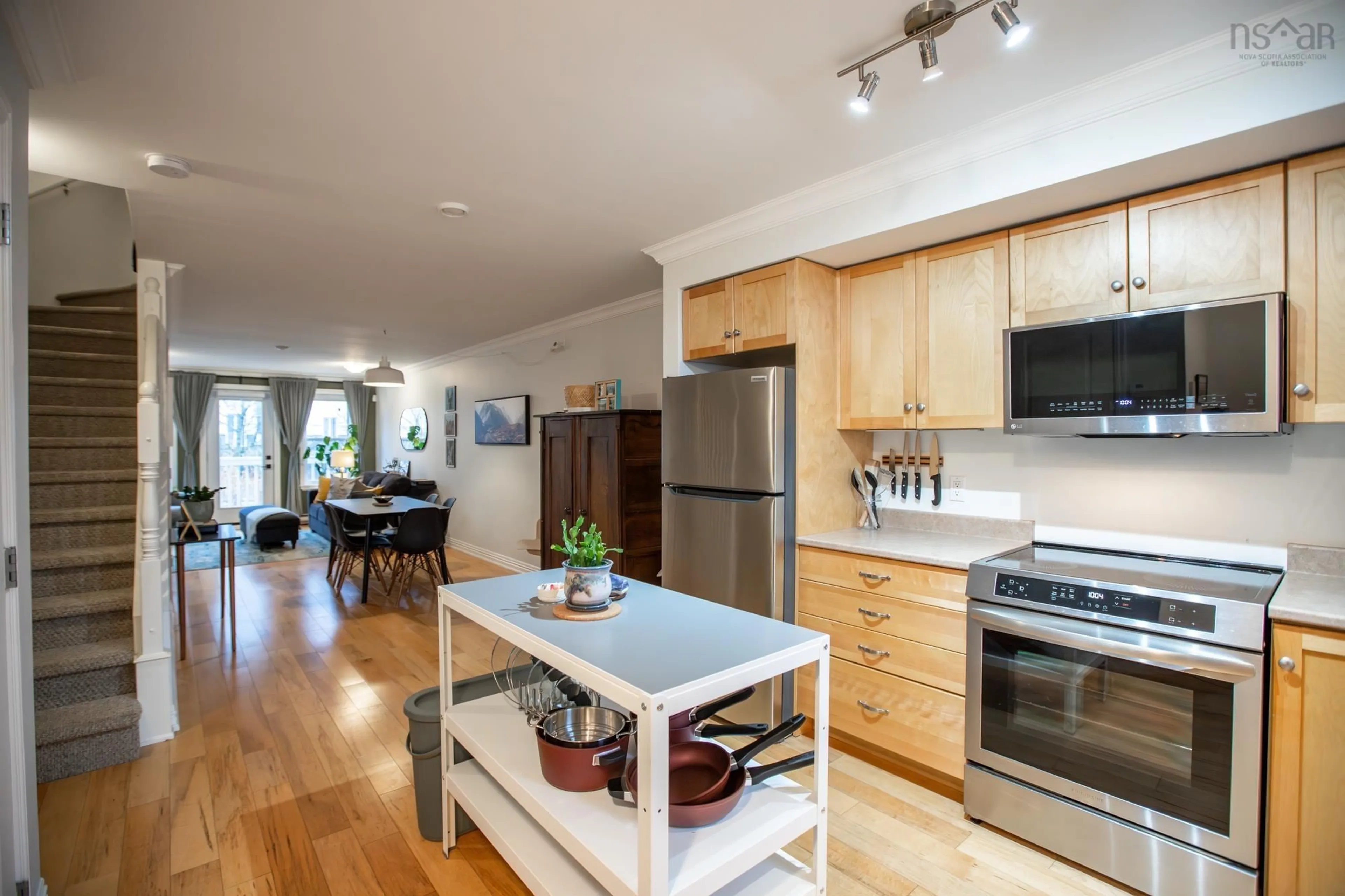 Open concept kitchen, wood/laminate floor for 204 52 Irishtown Rd, Dartmouth Nova Scotia B2Y 2W9