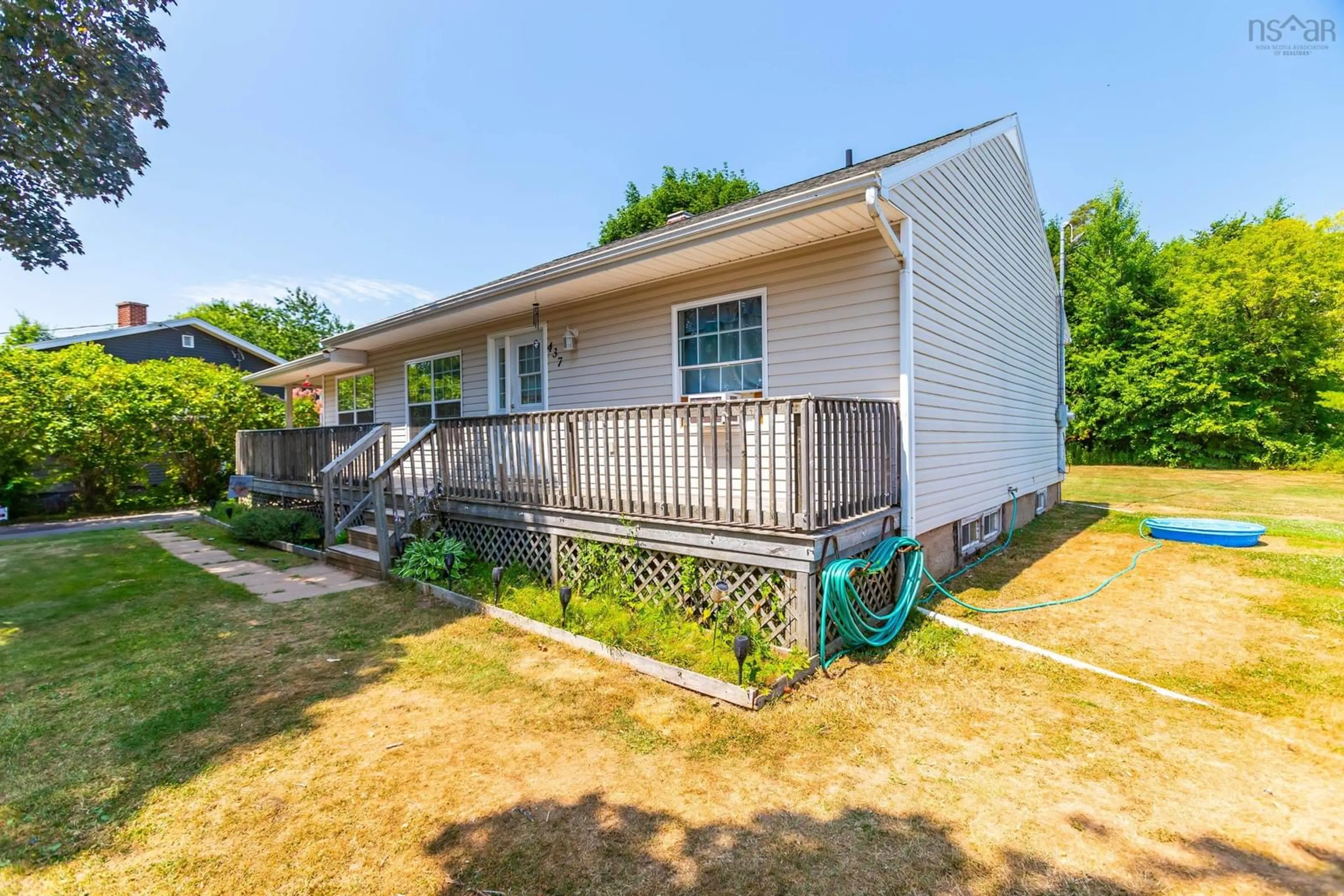 Home with vinyl exterior material, street for 437 Main St, Middleton Nova Scotia B0P 1M0