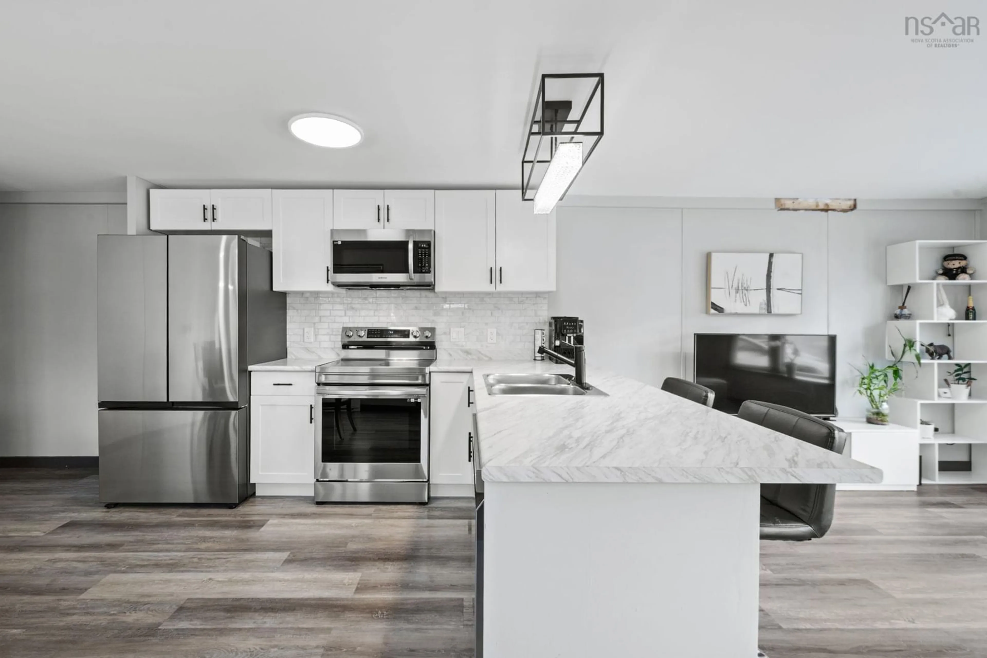 Open concept kitchen, ceramic/tile floor for 12 Stanley St, Middle Sackville Nova Scotia B4E 1E9