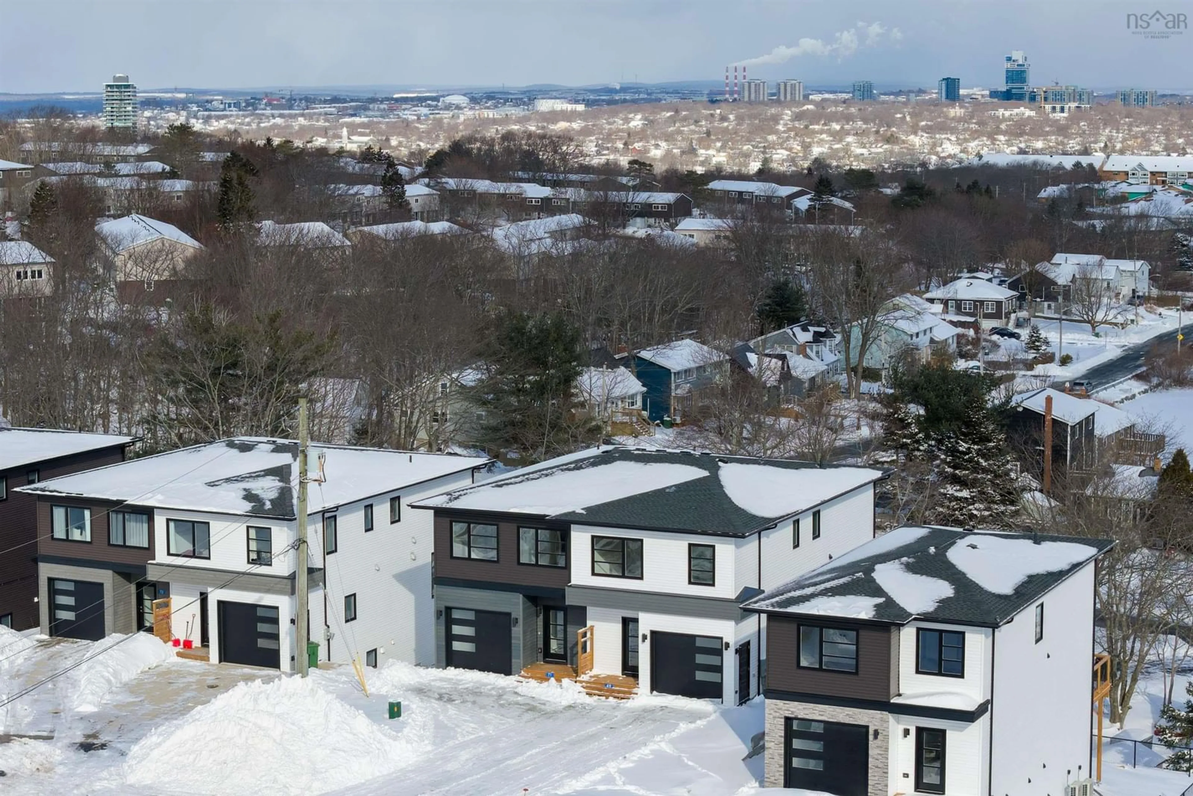A pic from outside/outdoor area/front of a property/back of a property/a pic from drone, mountain view for 69 Grenoble Crt, Long Lake Nova Scotia B3P 0J8