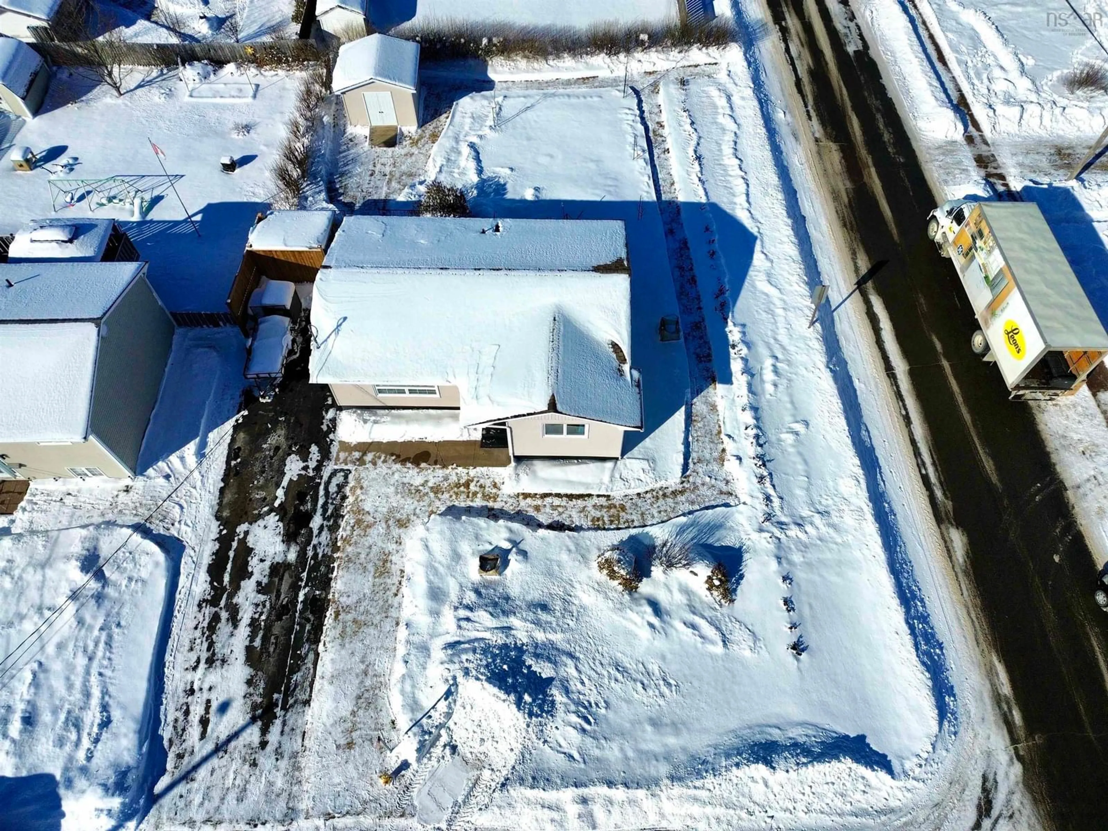 A pic from outside/outdoor area/front of a property/back of a property/a pic from drone, building for 24 Rhodes Ave, Amherst Nova Scotia B4H 2J2