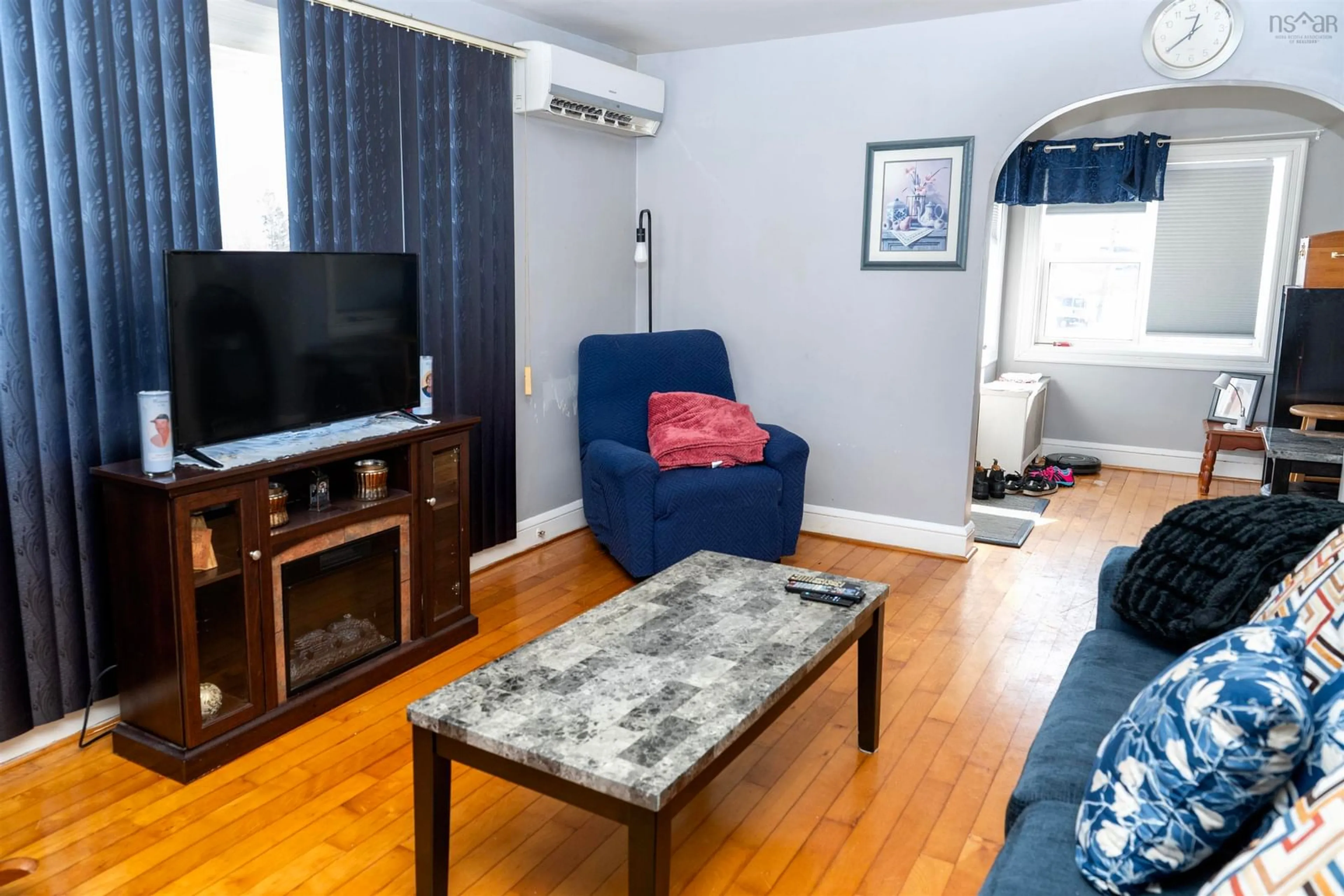 Living room with furniture, wood/laminate floor for 151 Lingan Rd, Sydney Nova Scotia B1N 1V4