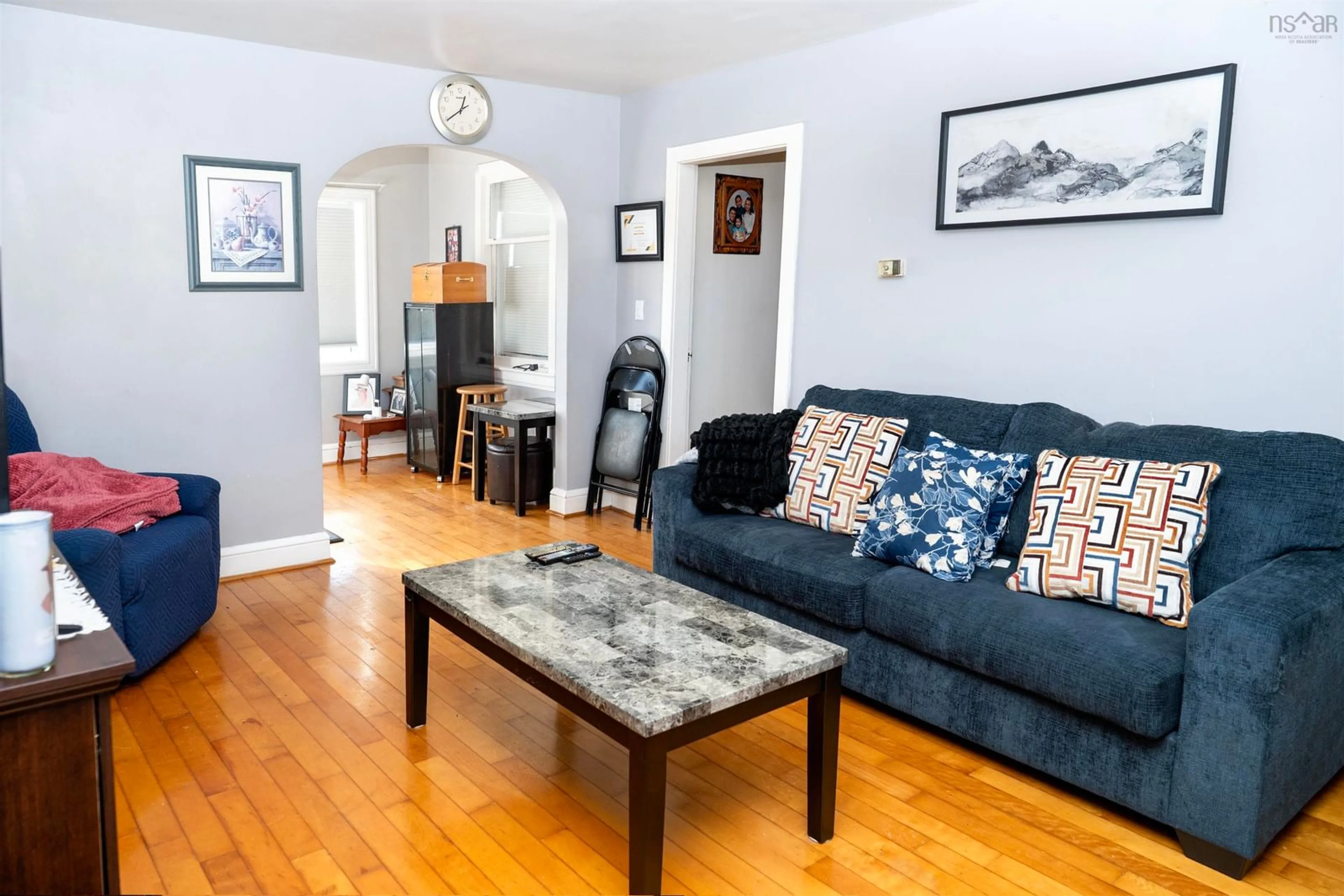 Living room with furniture, wood/laminate floor for 151 Lingan Rd, Sydney Nova Scotia B1N 1V4