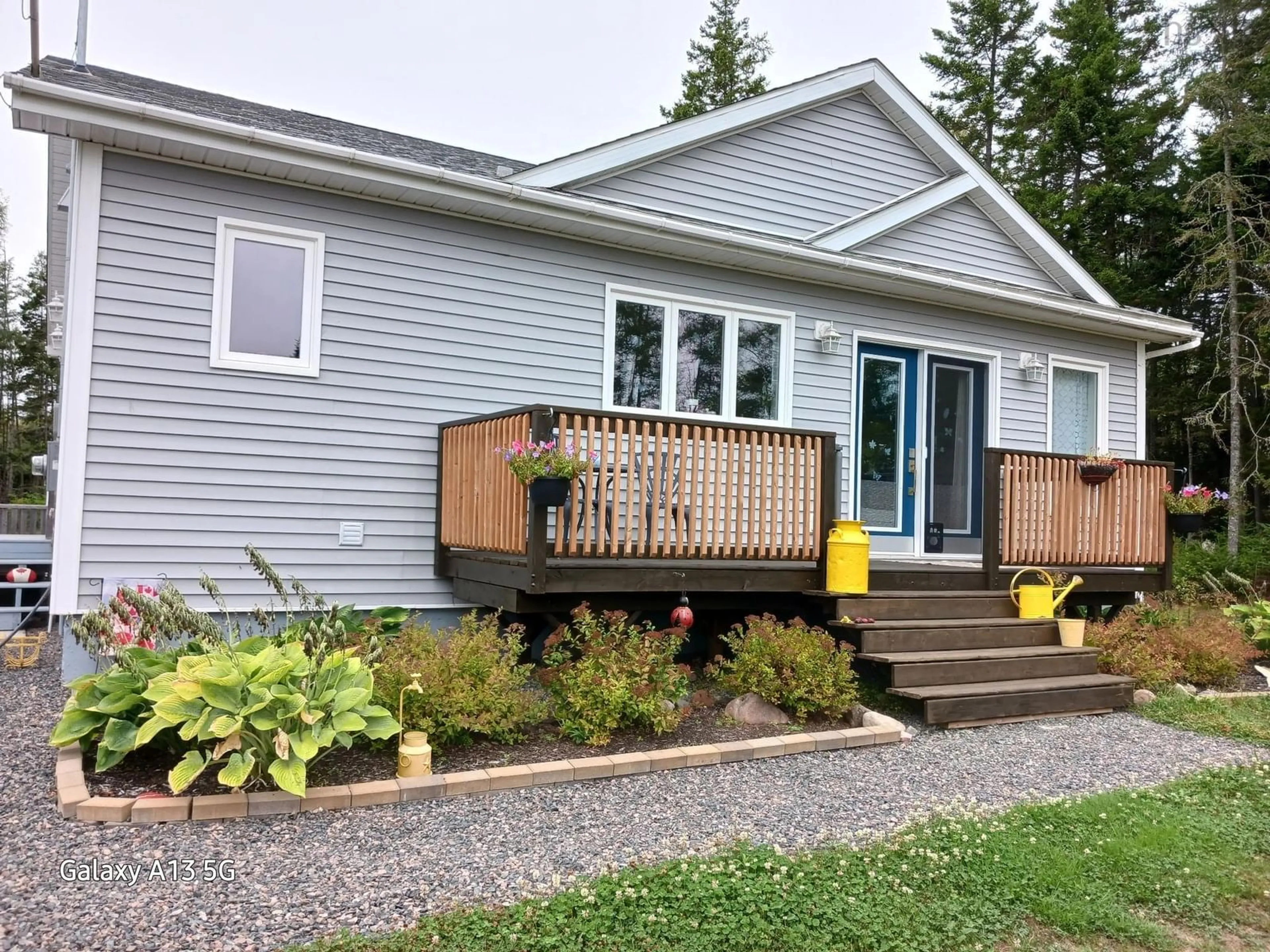 Home with vinyl exterior material, street for 99 Cross Rd, Great Village Nova Scotia B0M 1L0