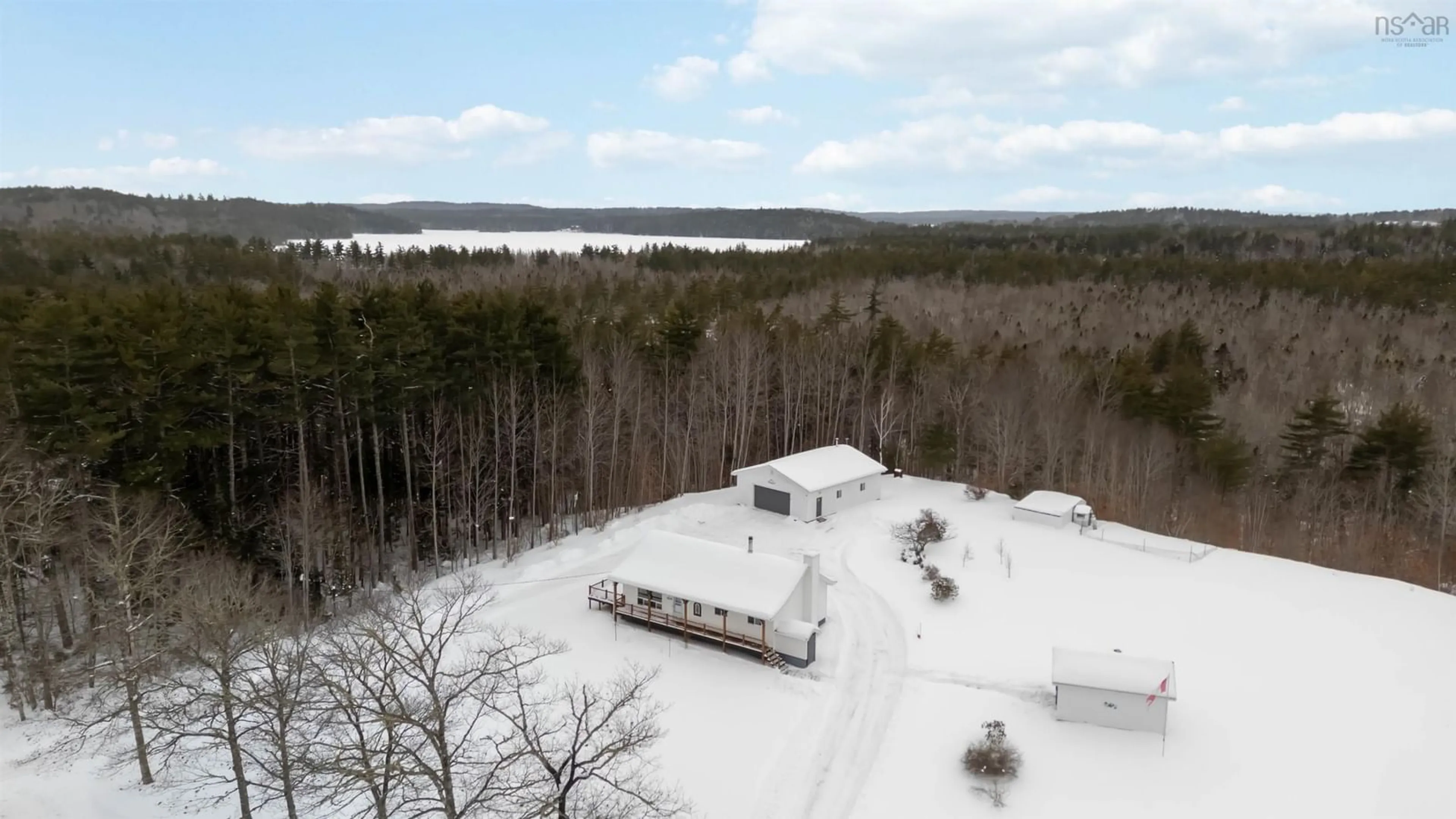 A pic from outside/outdoor area/front of a property/back of a property/a pic from drone, water/lake/river/ocean view for 8215 Highway 8, South Brookfield Nova Scotia B0T 1X0