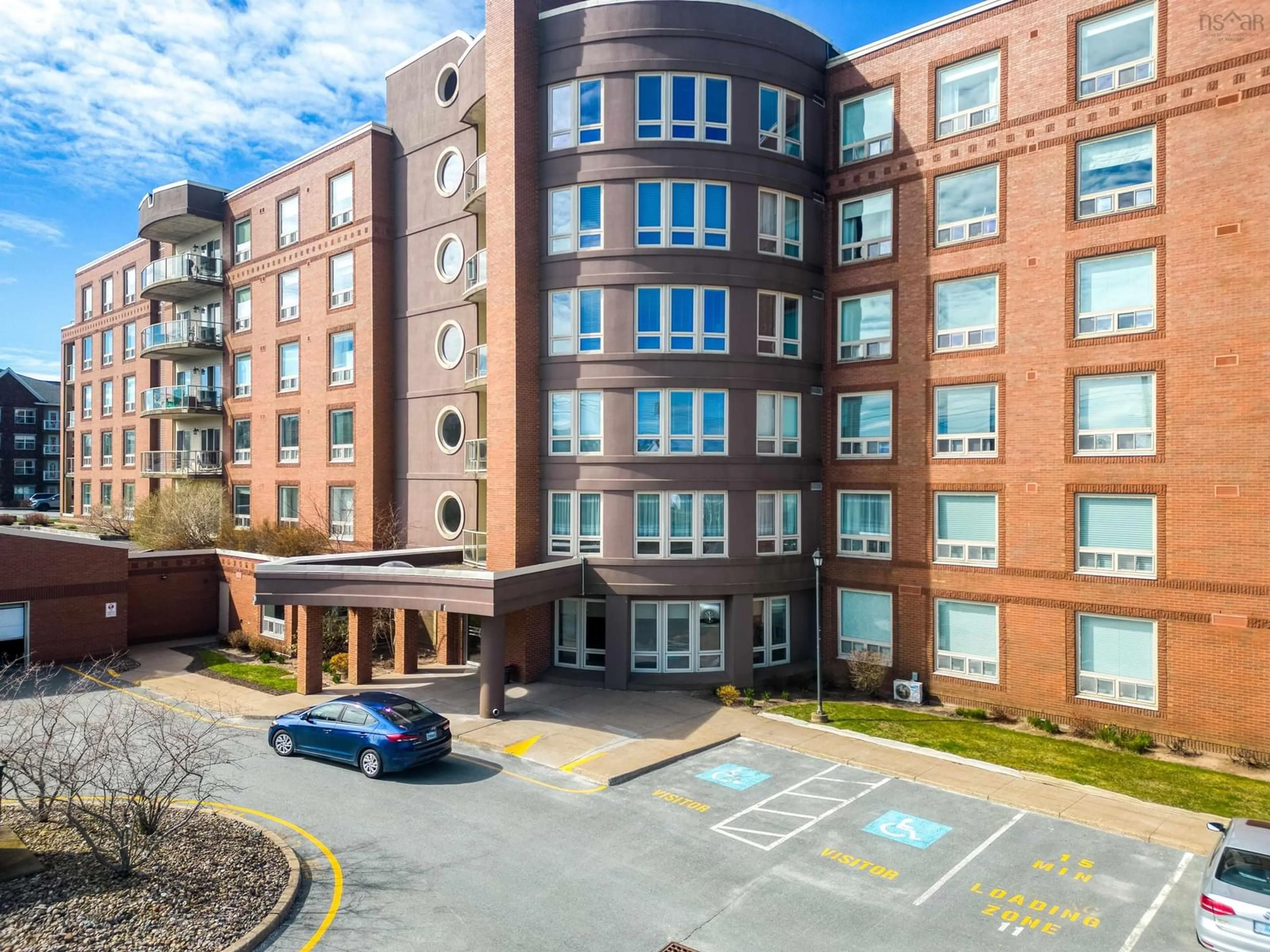 A pic from outside/outdoor area/front of a property/back of a property/a pic from drone, building for 77 Russell Lake Dr #102, Dartmouth Nova Scotia B2W 6R8