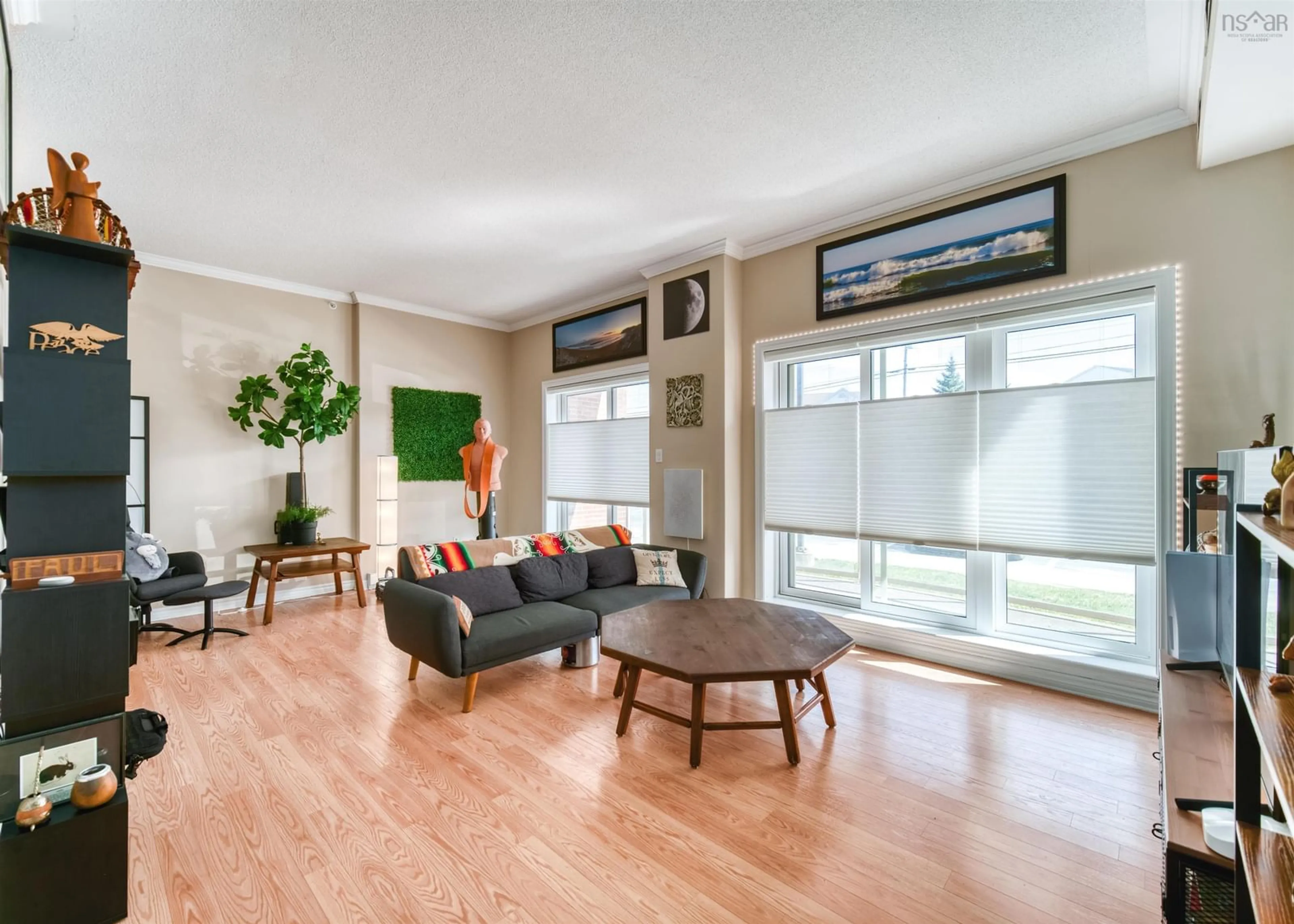Living room with furniture, wood/laminate floor for 77 Russell Lake Dr #102, Dartmouth Nova Scotia B2W 6R8