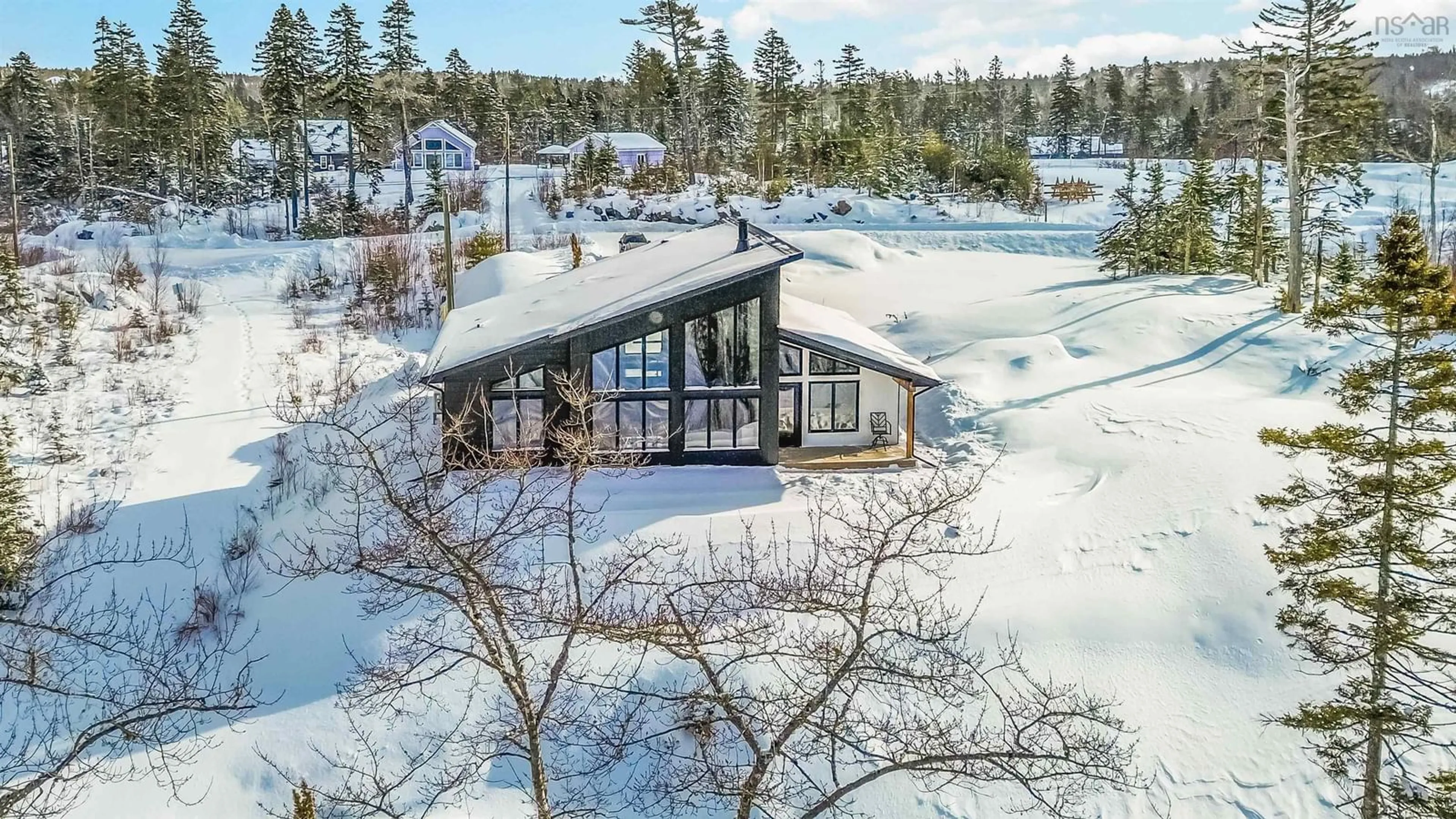 A pic from outside/outdoor area/front of a property/back of a property/a pic from drone, unknown for 242 Heritage Way, East Uniacke Nova Scotia B0N 1Z0