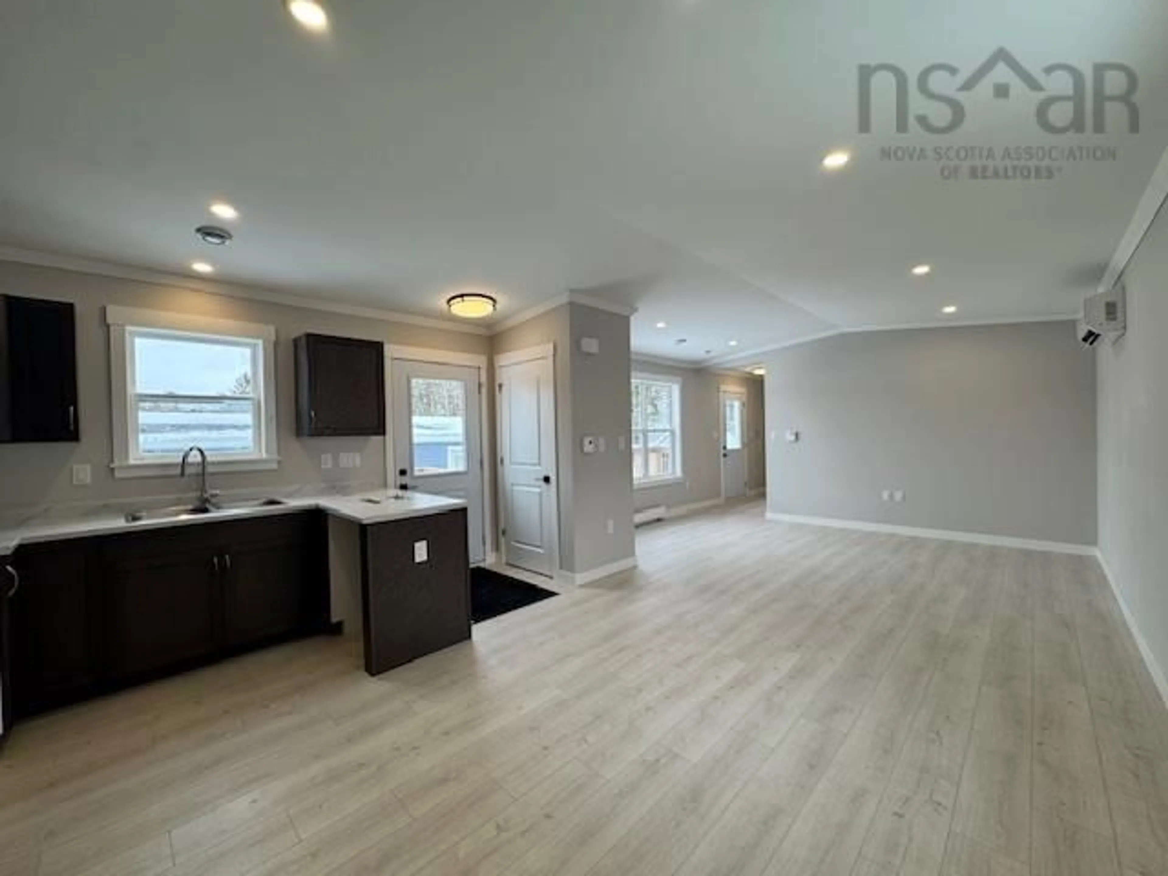 Open concept kitchen, wood/laminate floor for 29 Sharon Dr, Middle Sackville Nova Scotia B4E 1E7