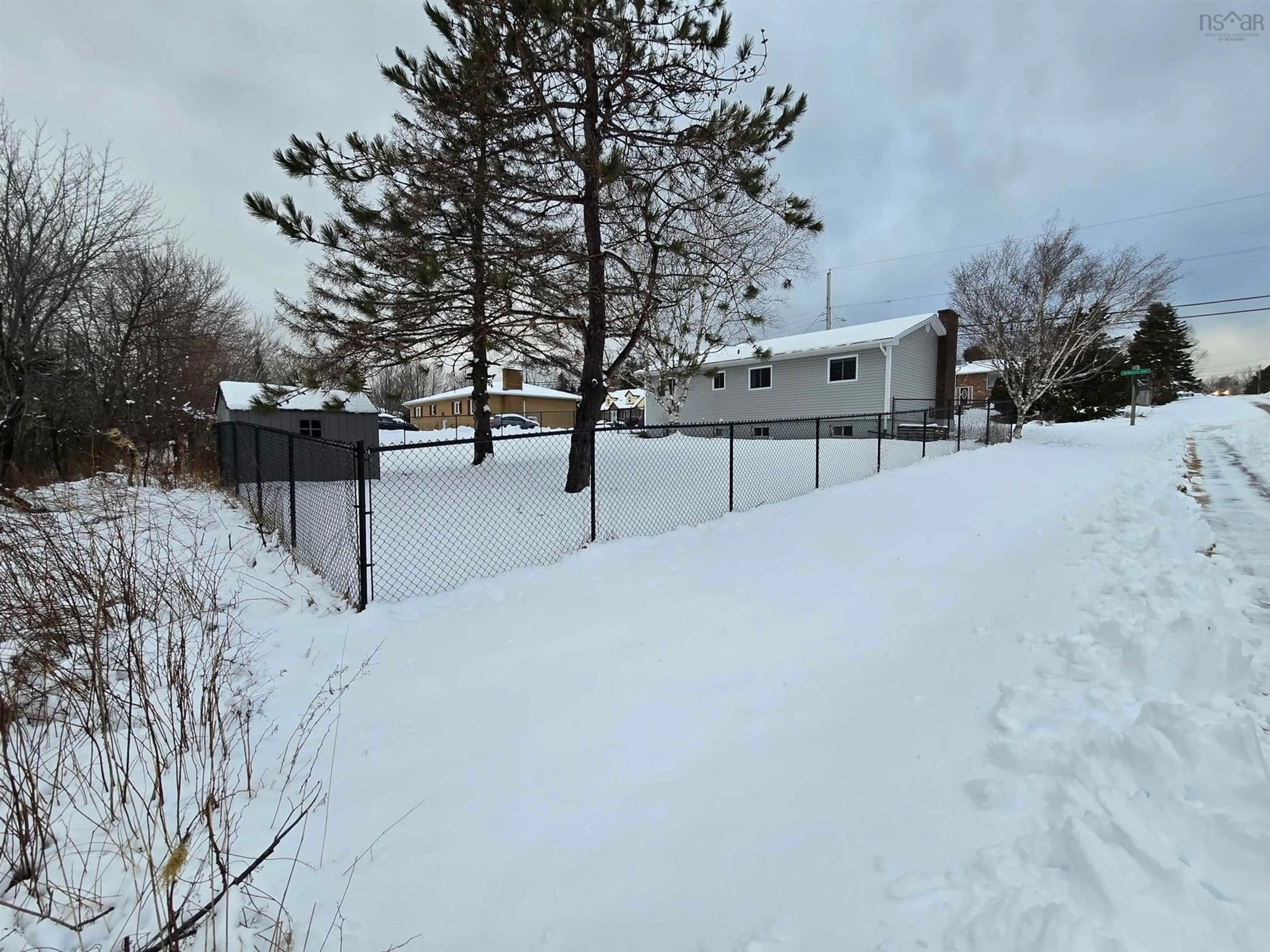 A pic from outside/outdoor area/front of a property/back of a property/a pic from drone, street for 1 Anderson Ave, Coxheath Nova Scotia B1R 2B5