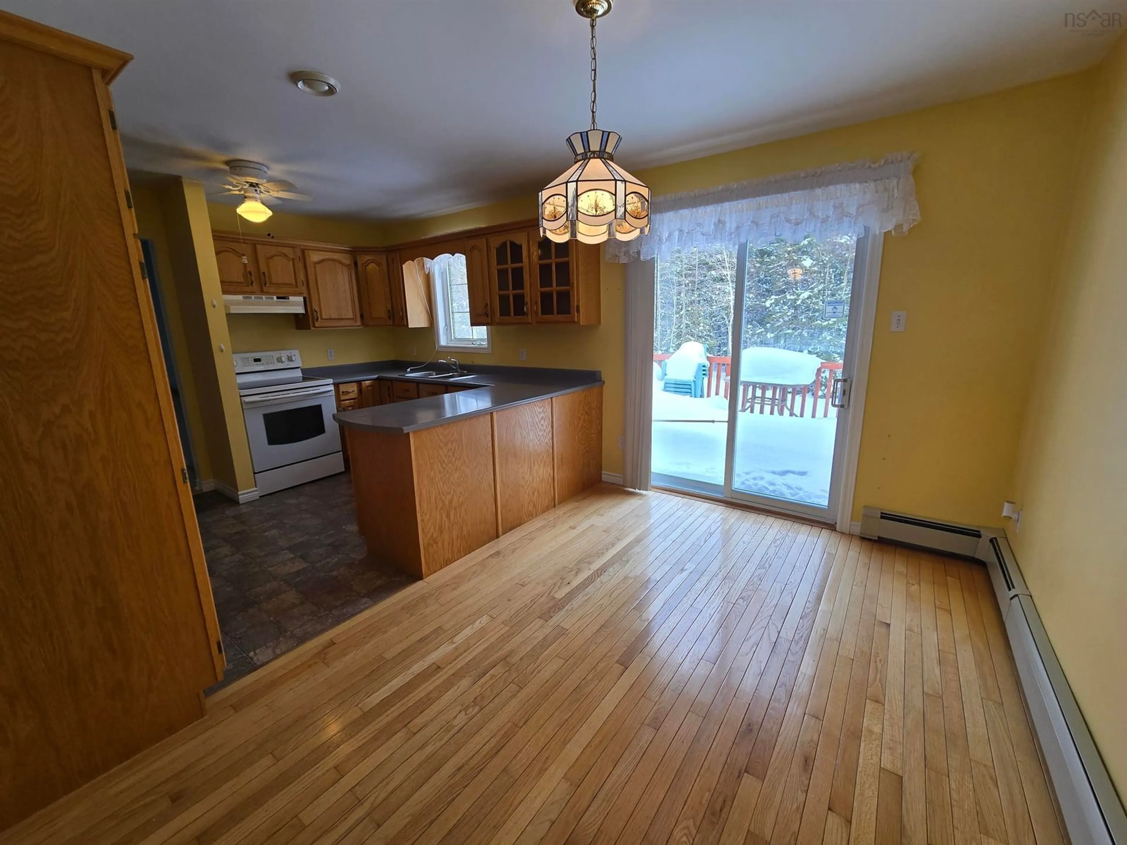 Open concept kitchen, wood/laminate floor for 47 River Rd, Albert Bridge Nova Scotia B1K 3G4
