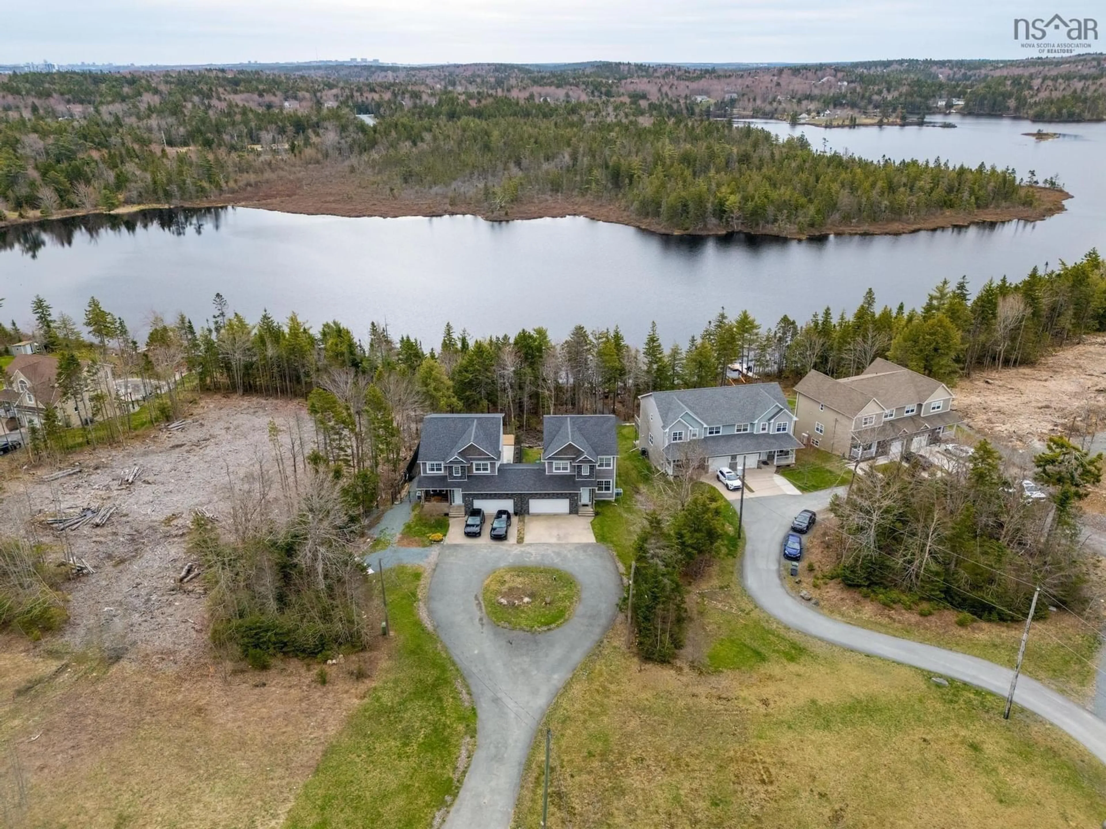 A pic from outside/outdoor area/front of a property/back of a property/a pic from drone, water/lake/river/ocean view for 214 Voyageur Way, Hammonds Plains Nova Scotia B4B 0N1