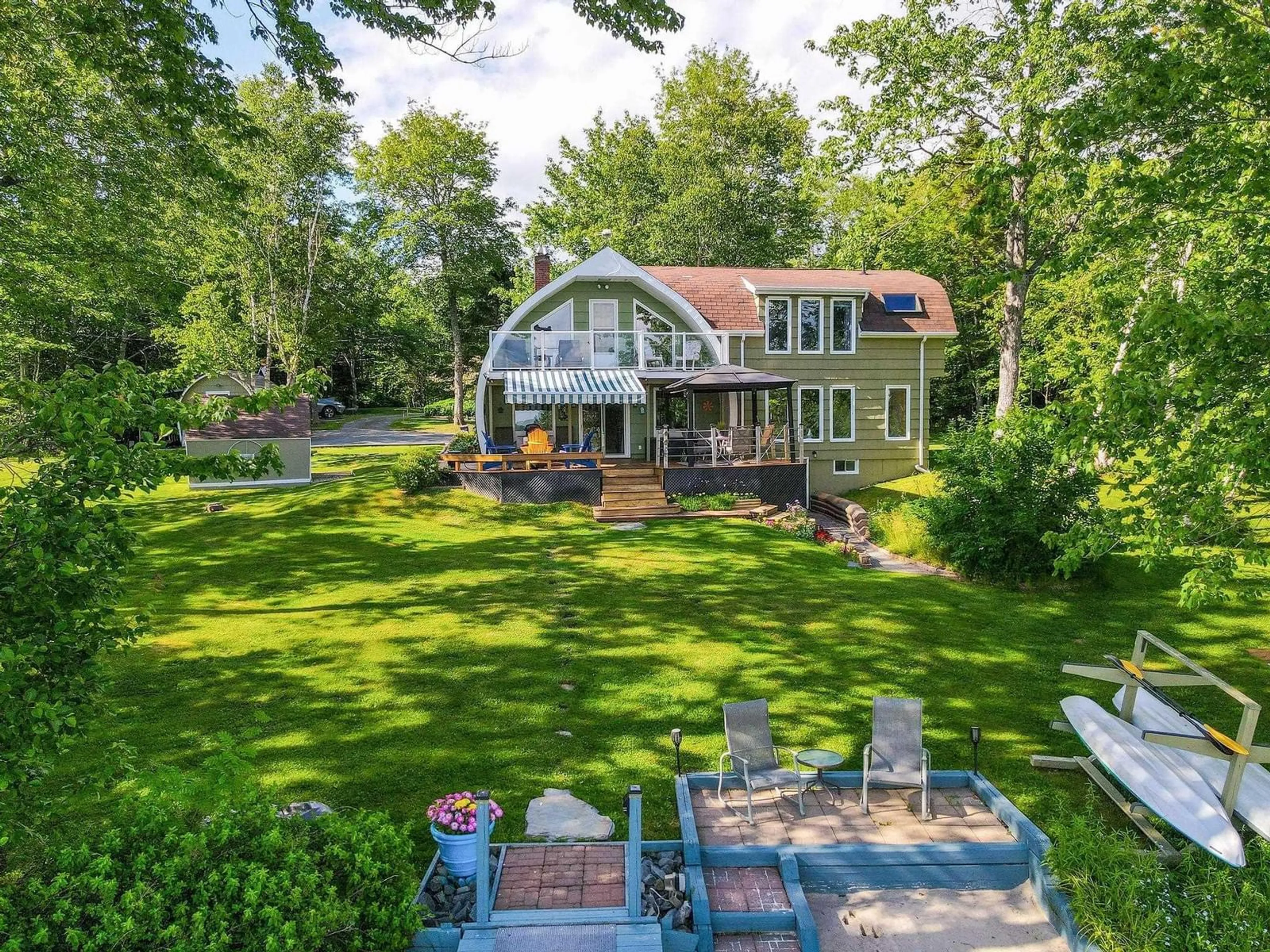 A pic from outside/outdoor area/front of a property/back of a property/a pic from drone, water/lake/river/ocean view for 183 Lakewood Dr, Shortts Lake Nova Scotia B2N 1C0
