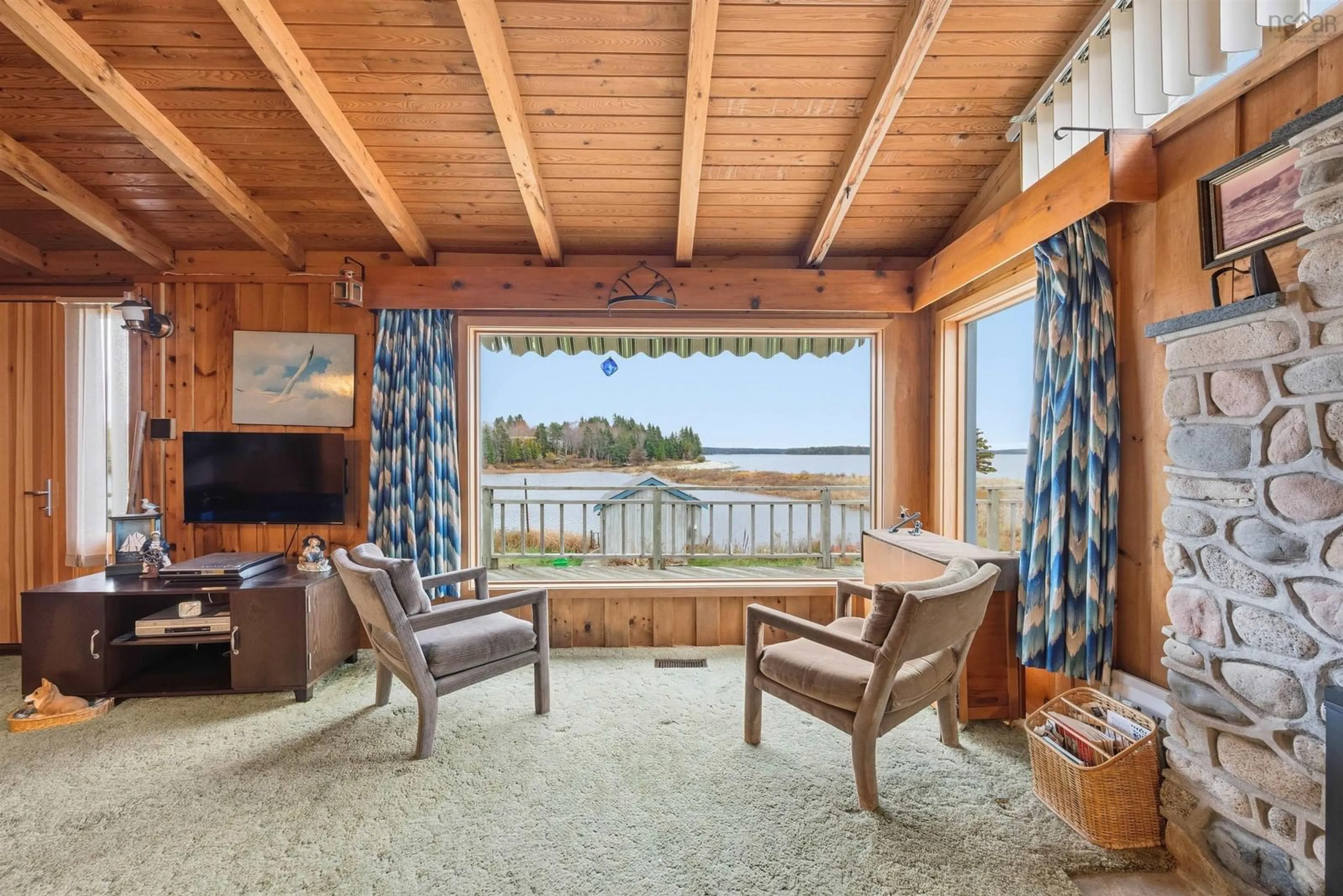 Living room with furniture, unknown for 8278 St Margarets Bay Rd, Black Point Nova Scotia B0J 0C2