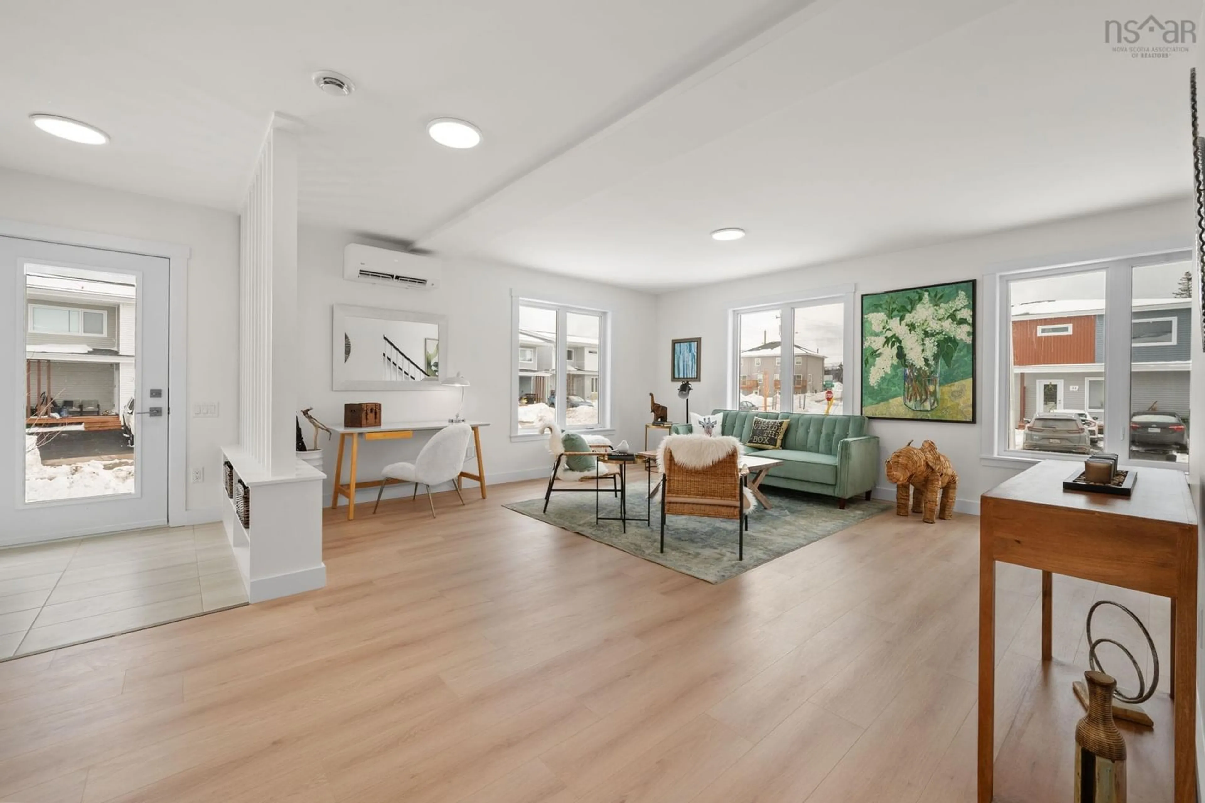 Living room with furniture, unknown for 52 Berm St, Herring Cove Nova Scotia B3R 0H2