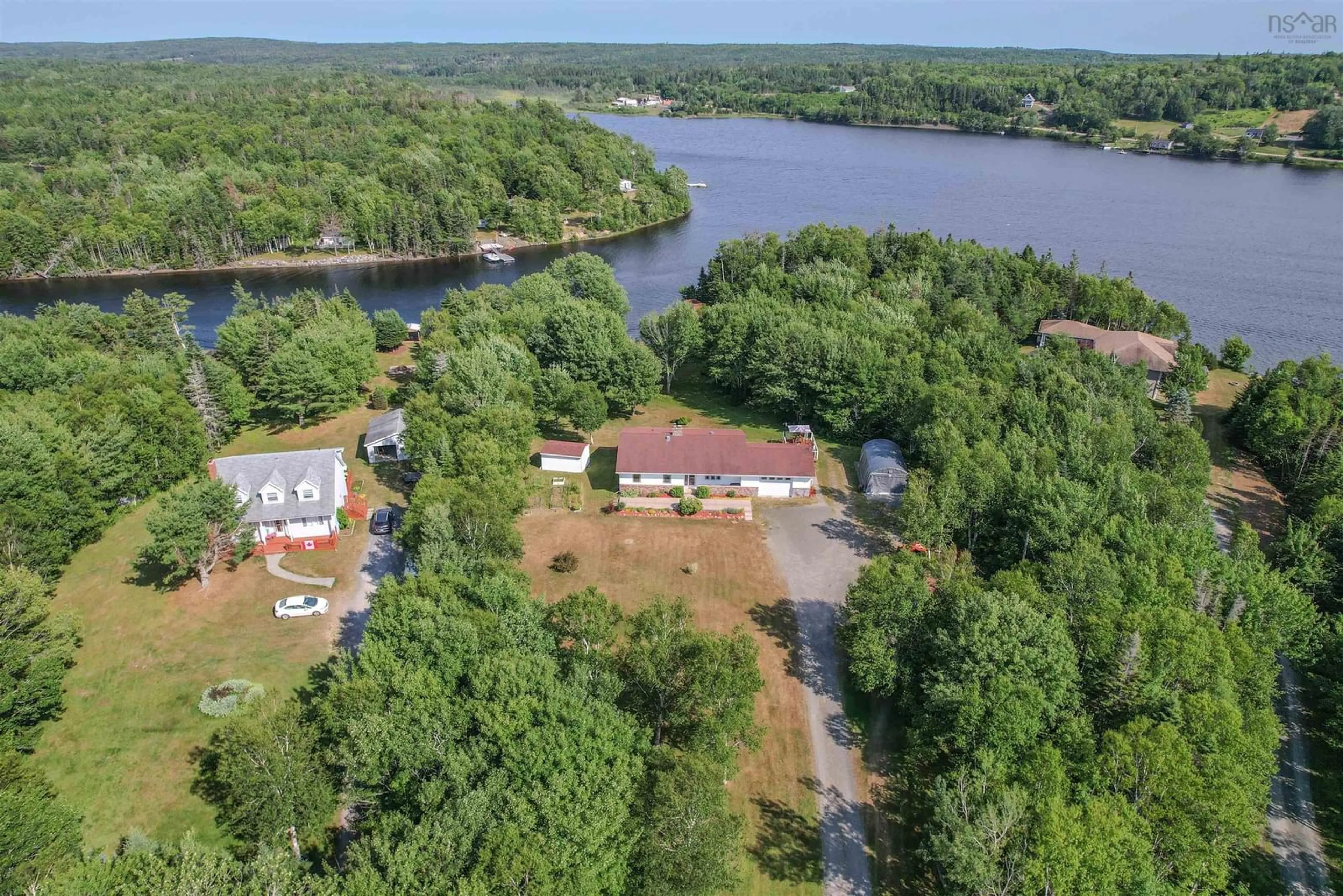A pic from outside/outdoor area/front of a property/back of a property/a pic from drone, water/lake/river/ocean view for 166 Oakfield Dr, Marion Bridge Nova Scotia B1K 3N7