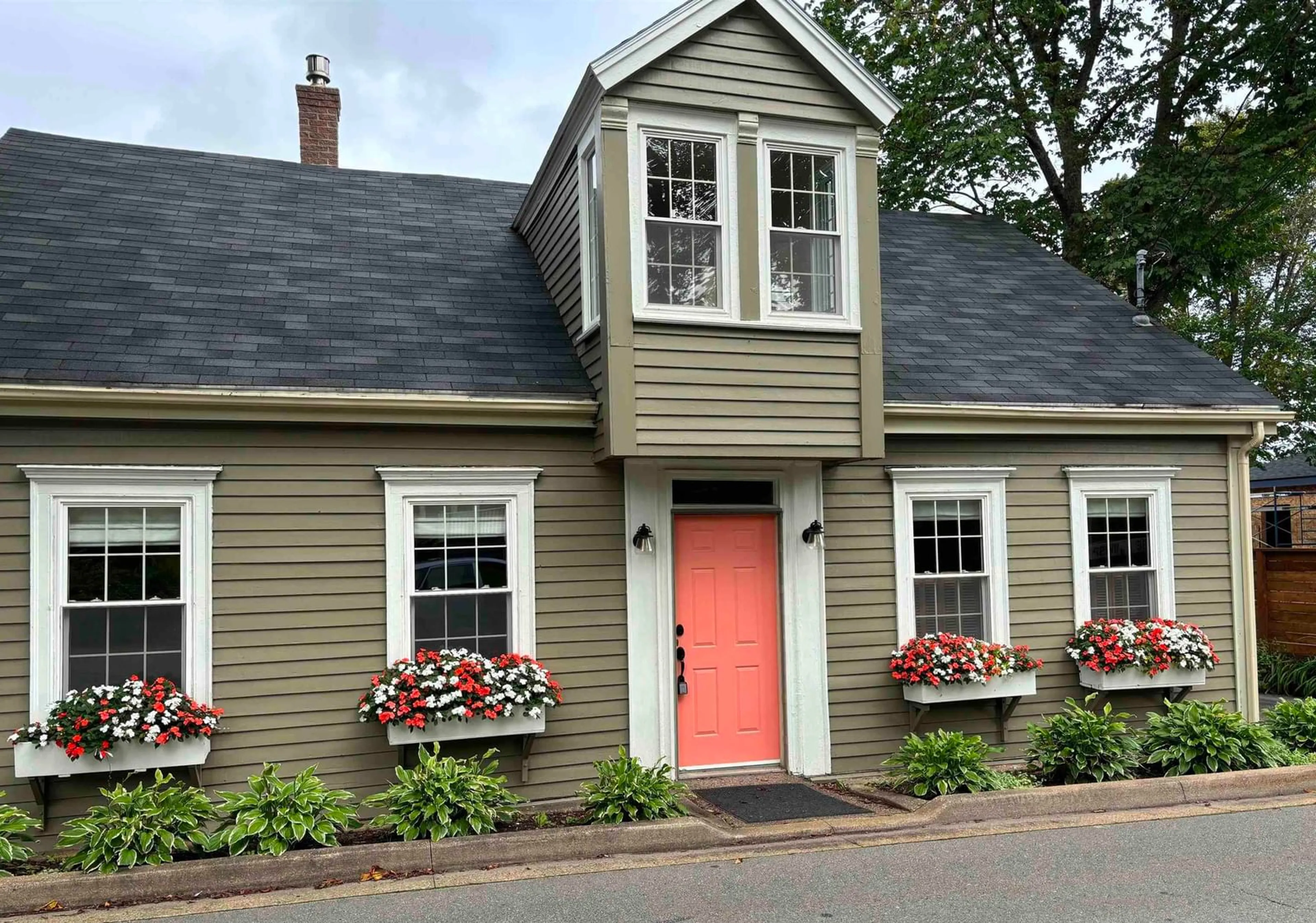 Home with vinyl exterior material, street for 66 Main St, Liverpool Nova Scotia B0T 1K0