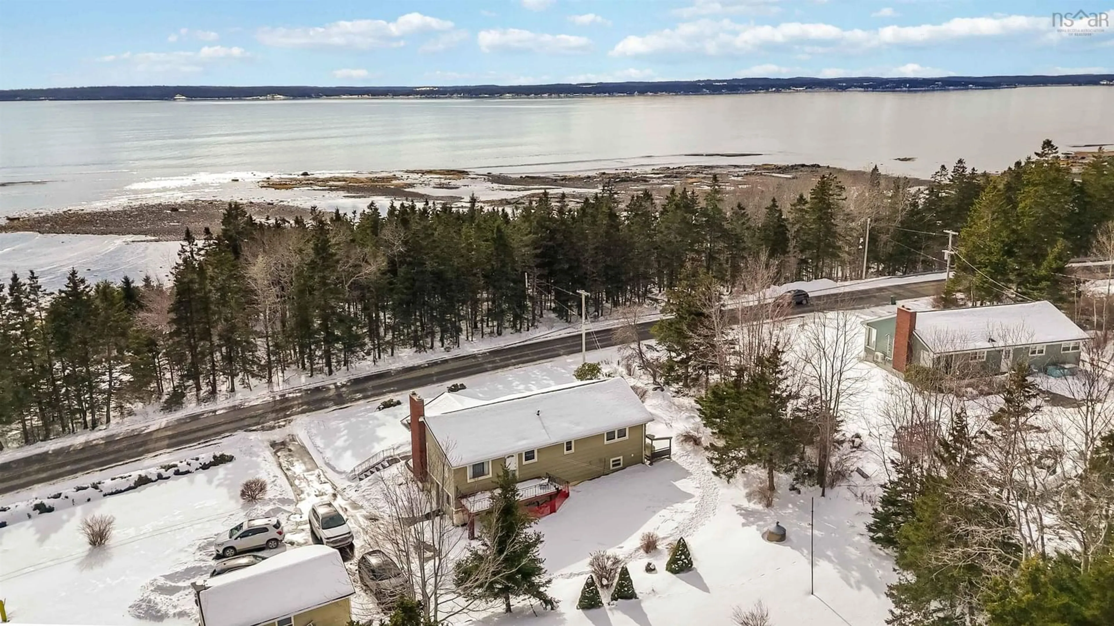 A pic from outside/outdoor area/front of a property/back of a property/a pic from drone, water/lake/river/ocean view for 1157 Blue Rocks Rd, Blue Rocks Nova Scotia B0J 2C0