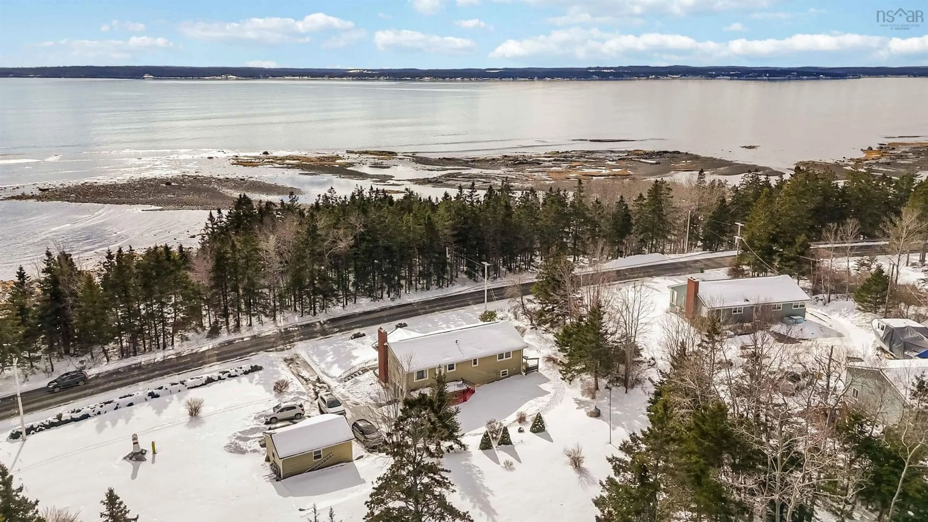 A pic from outside/outdoor area/front of a property/back of a property/a pic from drone, water/lake/river/ocean view for 1157 Blue Rocks Rd, Blue Rocks Nova Scotia B0J 2C0
