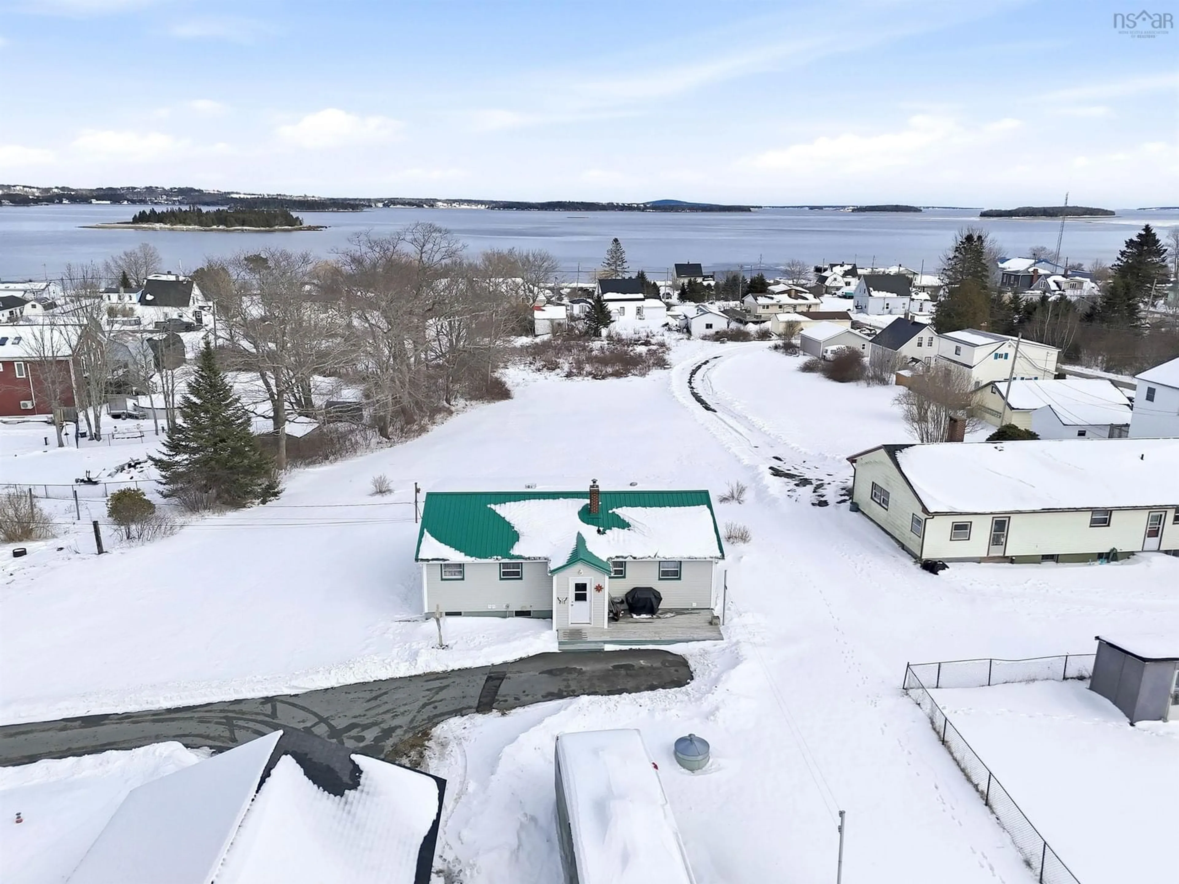 A pic from outside/outdoor area/front of a property/back of a property/a pic from drone, water/lake/river/ocean view for 17 Freds Rd, Western Shore Nova Scotia B0J 3M0