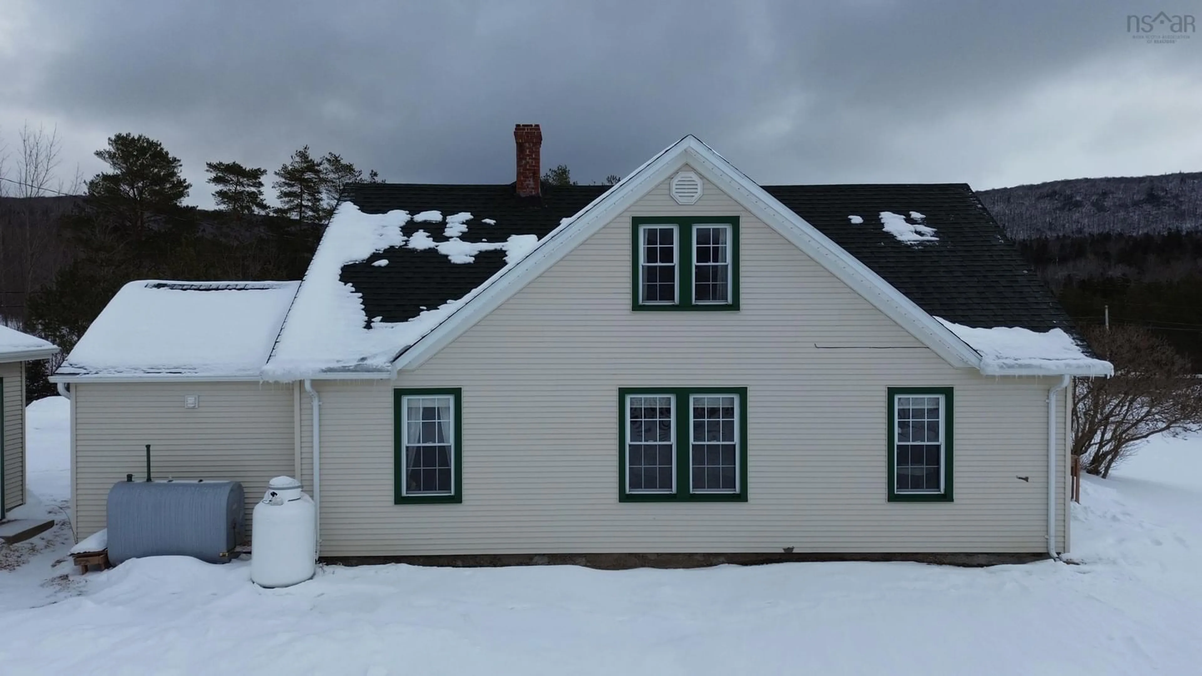 Home with vinyl exterior material, building for 9596 105 Hwy, Whycocomagh Nova Scotia B0E 3M0