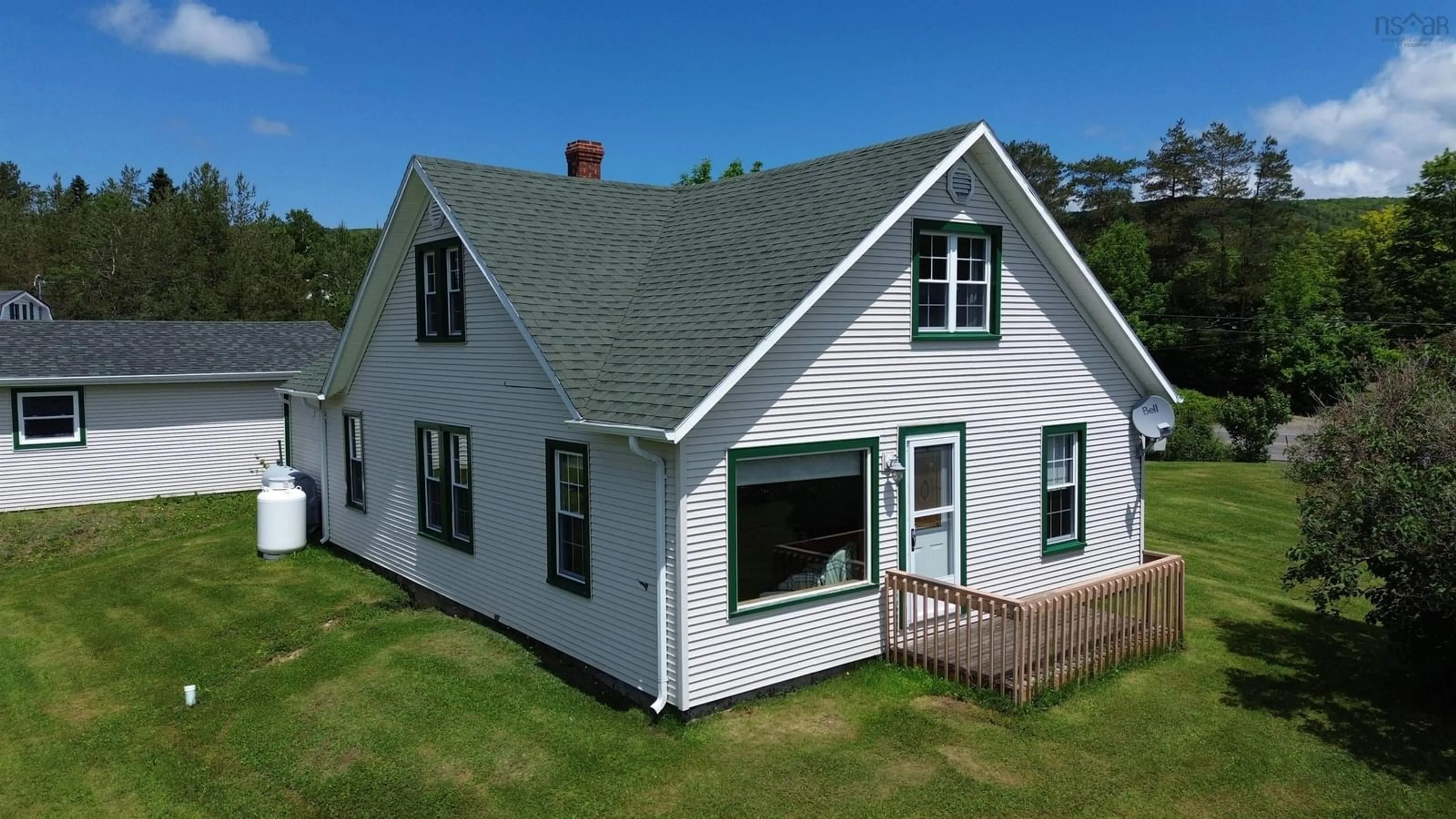 A pic from outside/outdoor area/front of a property/back of a property/a pic from drone, building for 9596 105 Hwy, Whycocomagh Nova Scotia B0E 3M0