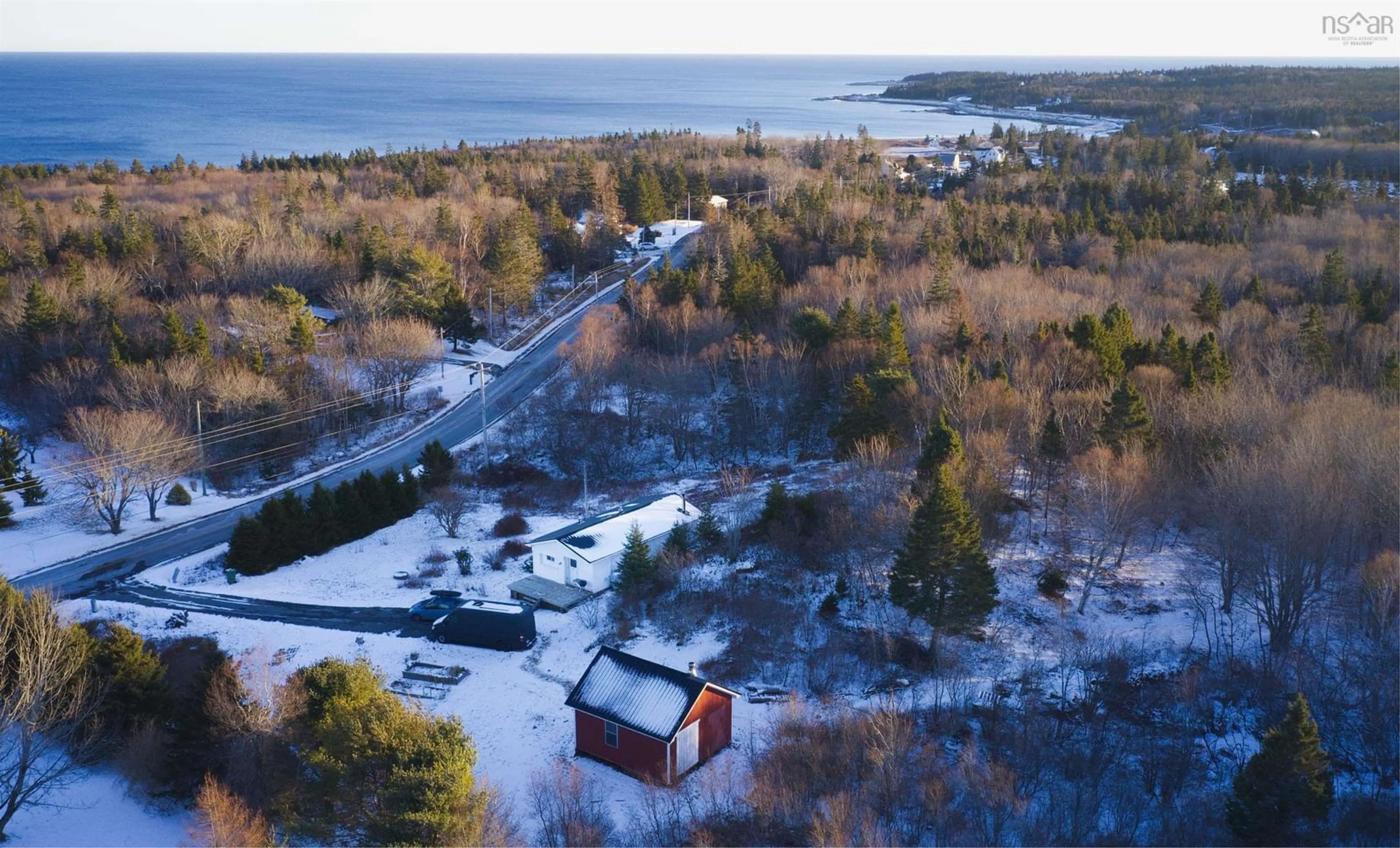 A pic from outside/outdoor area/front of a property/back of a property/a pic from drone, water/lake/river/ocean view for 876 Shore Rd, Moose Harbour Nova Scotia B0T 1K0