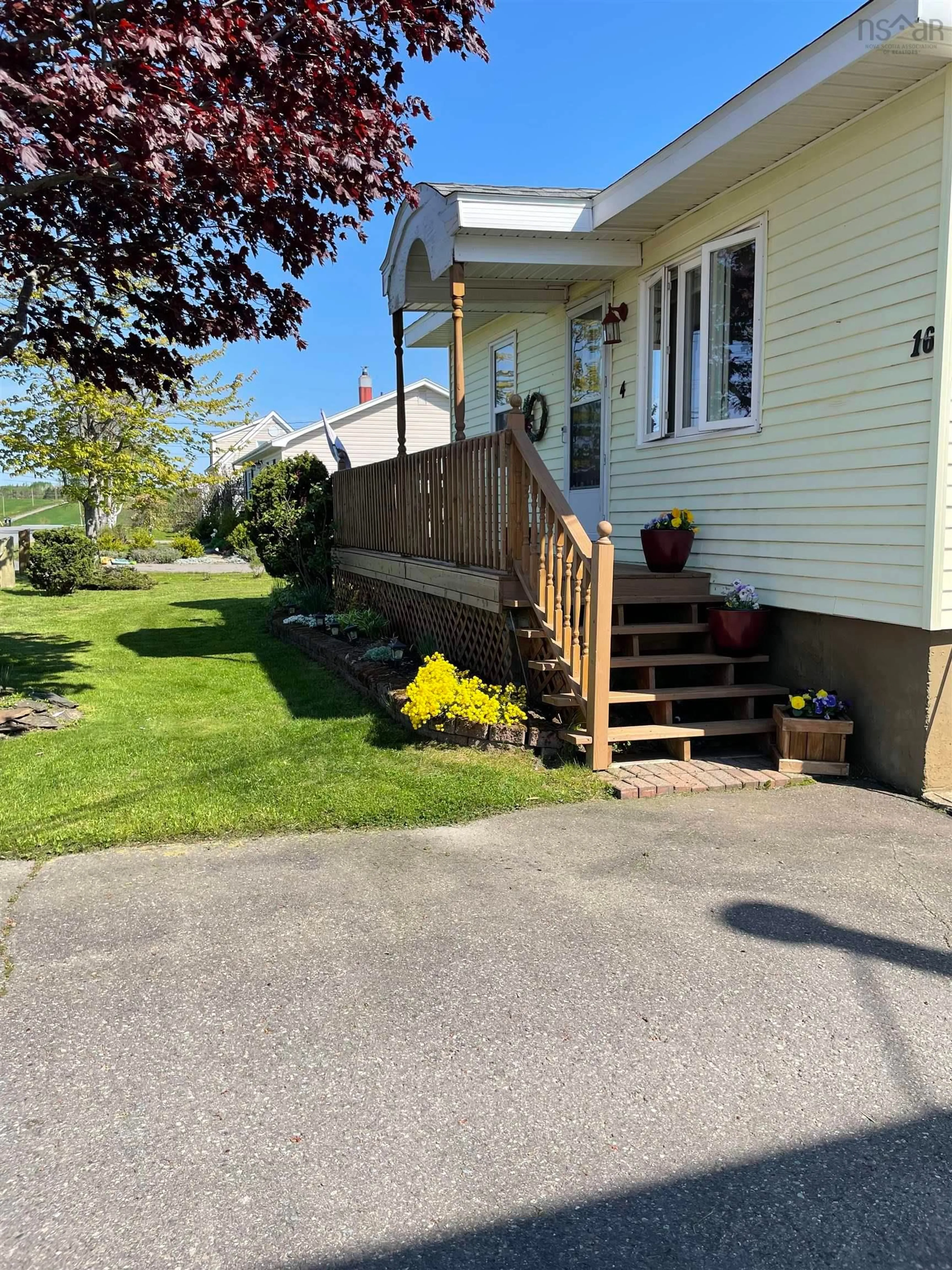 A pic from outside/outdoor area/front of a property/back of a property/a pic from drone, street for 16 D Macisaac Road, Post Road Nova Scotia B2G 2J9