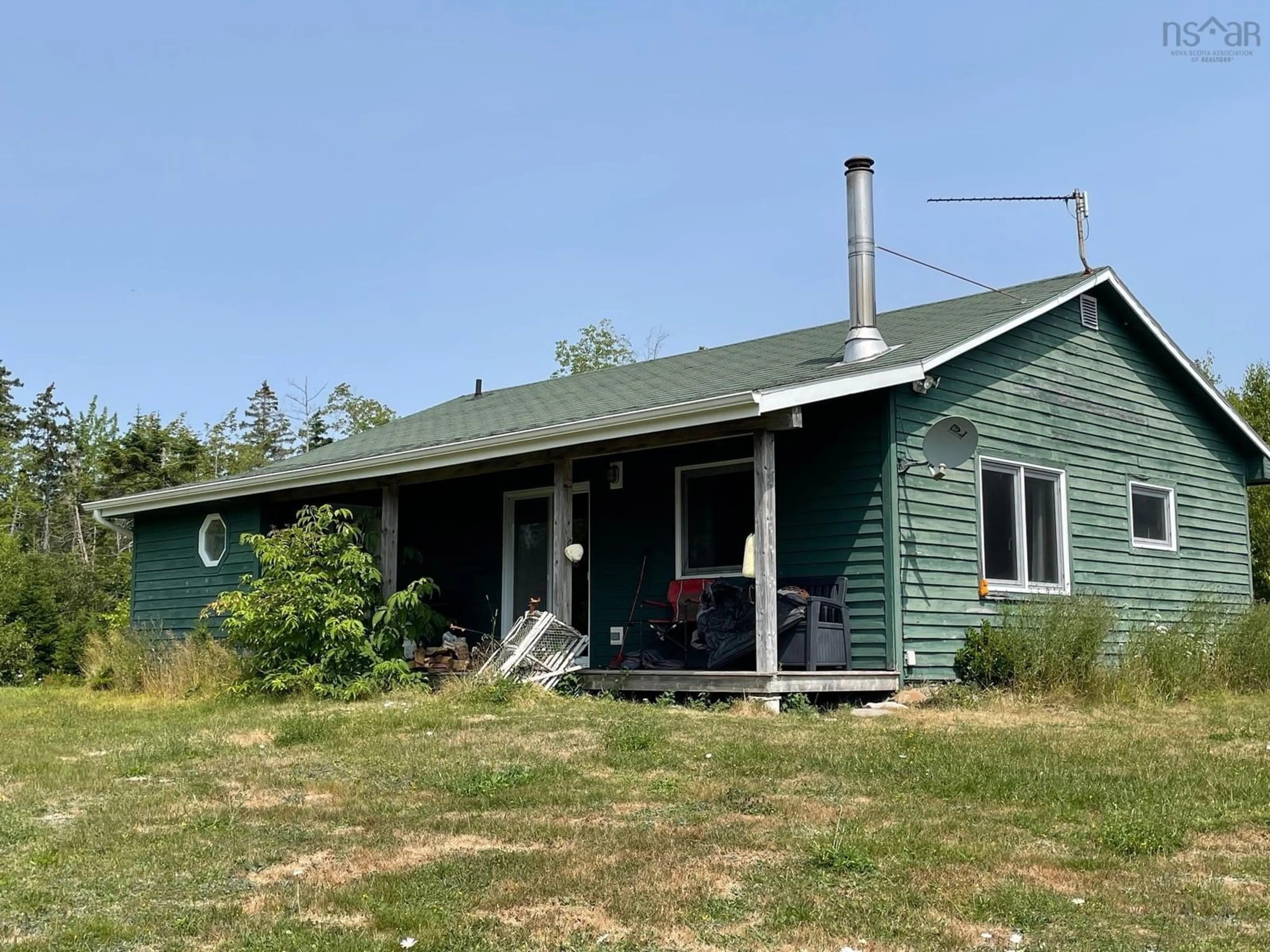A pic from outside/outdoor area/front of a property/back of a property/a pic from drone, building for 311 Richards Pond Rd, River Bourgeois Nova Scotia B0E 2X0