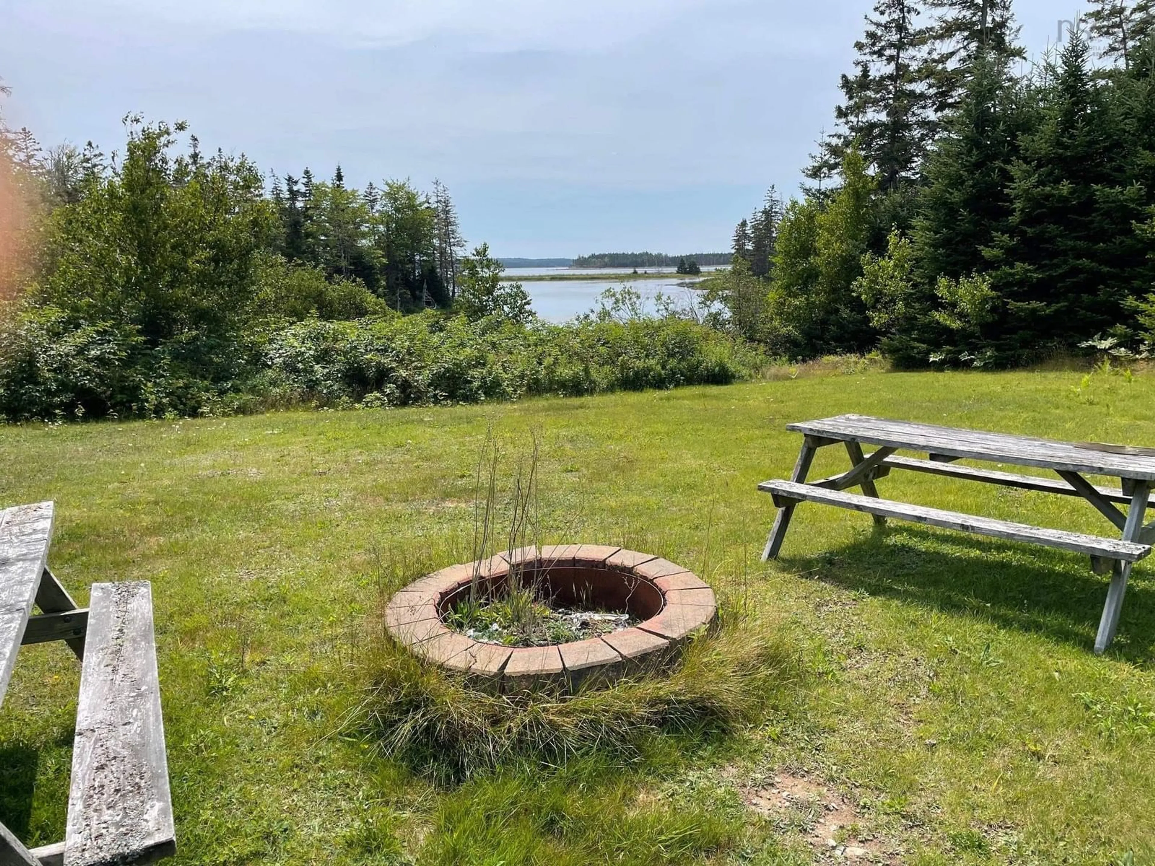 Patio, water/lake/river/ocean view for 311 Richards Pond Rd, River Bourgeois Nova Scotia B0E 2X0