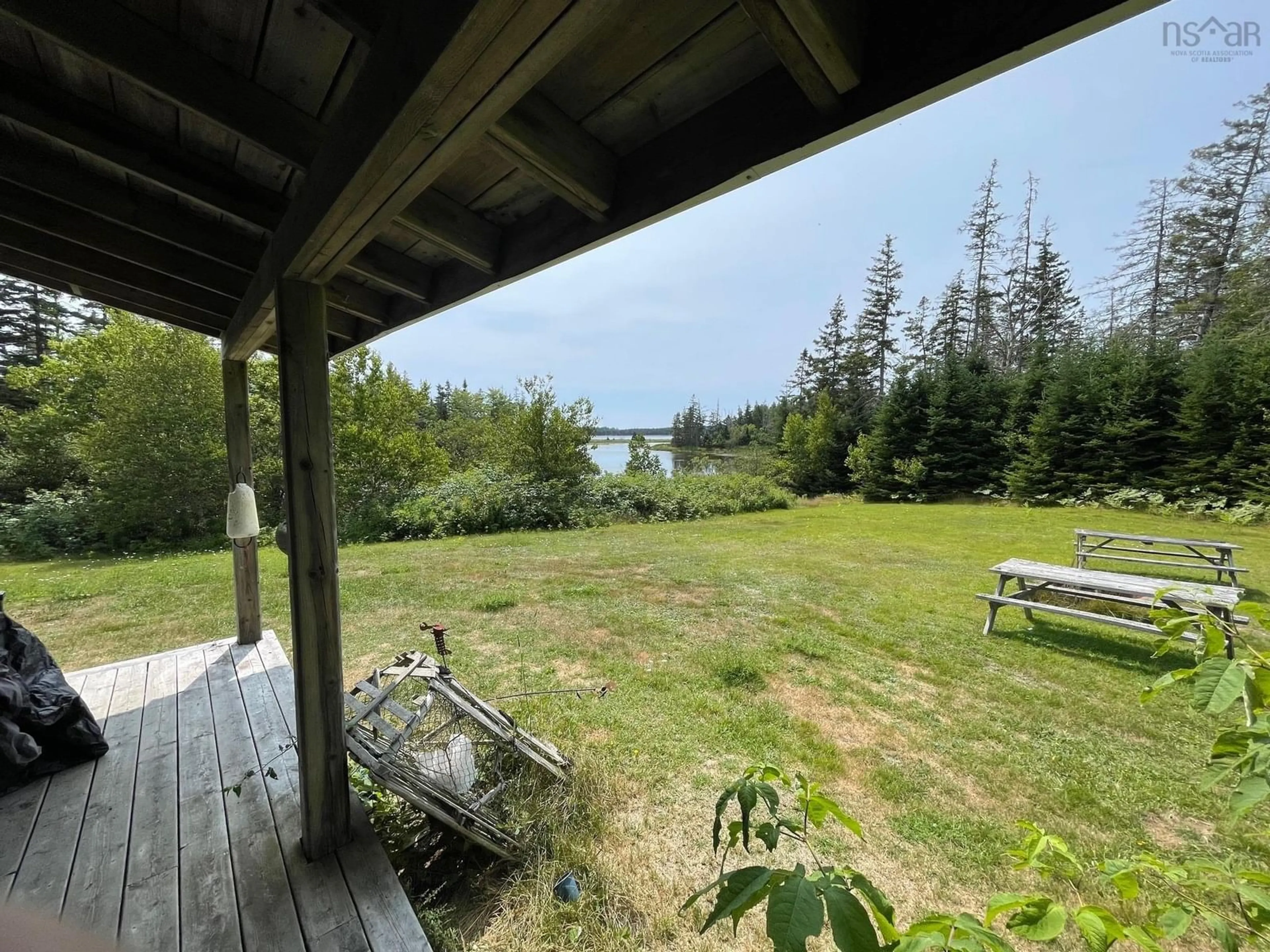 Patio, water/lake/river/ocean view for 311 Richards Pond Rd, River Bourgeois Nova Scotia B0E 2X0