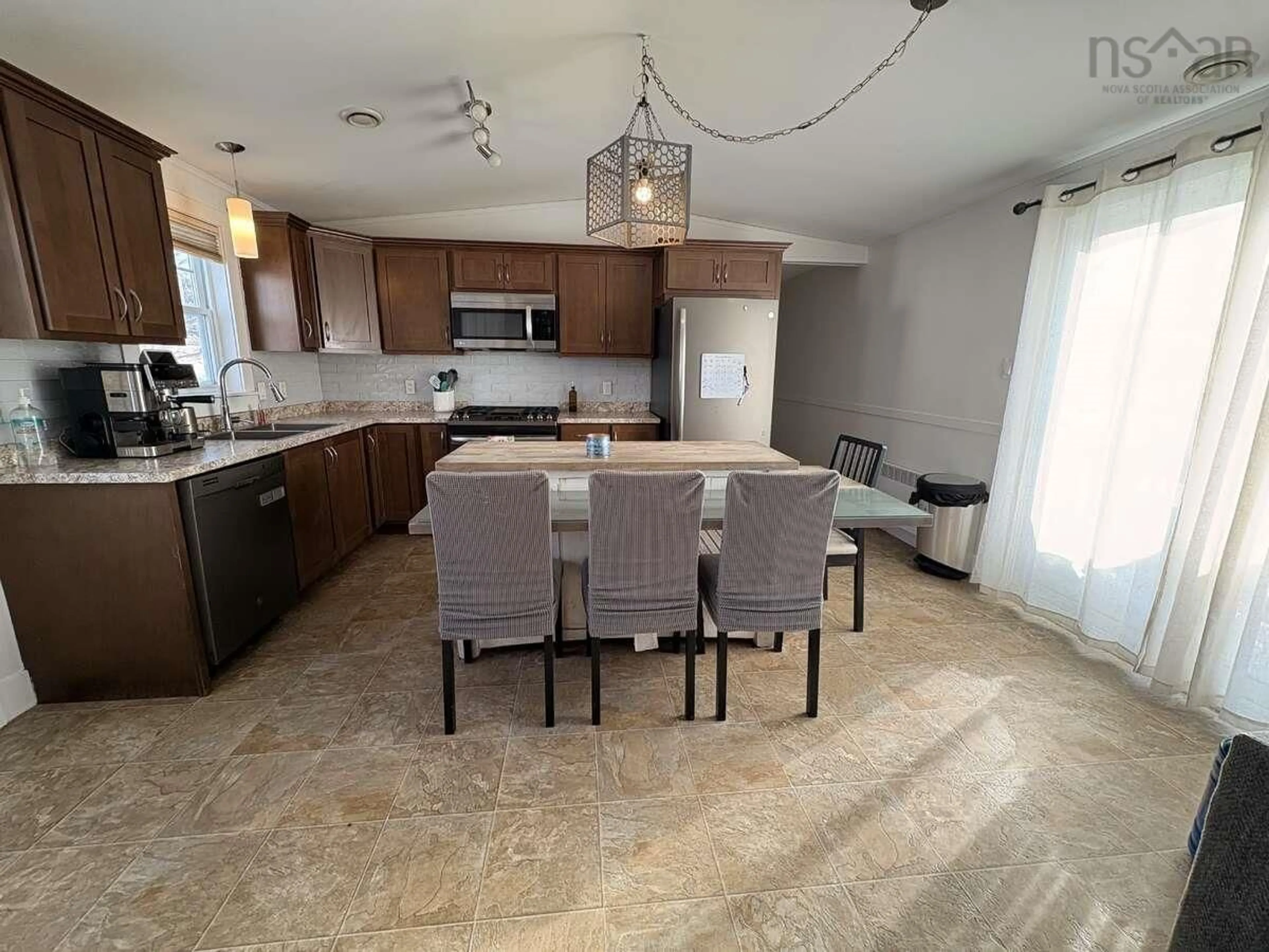 Open concept kitchen, unknown for 24 Mackenzie Ave, Inverness Nova Scotia B0E 1N0