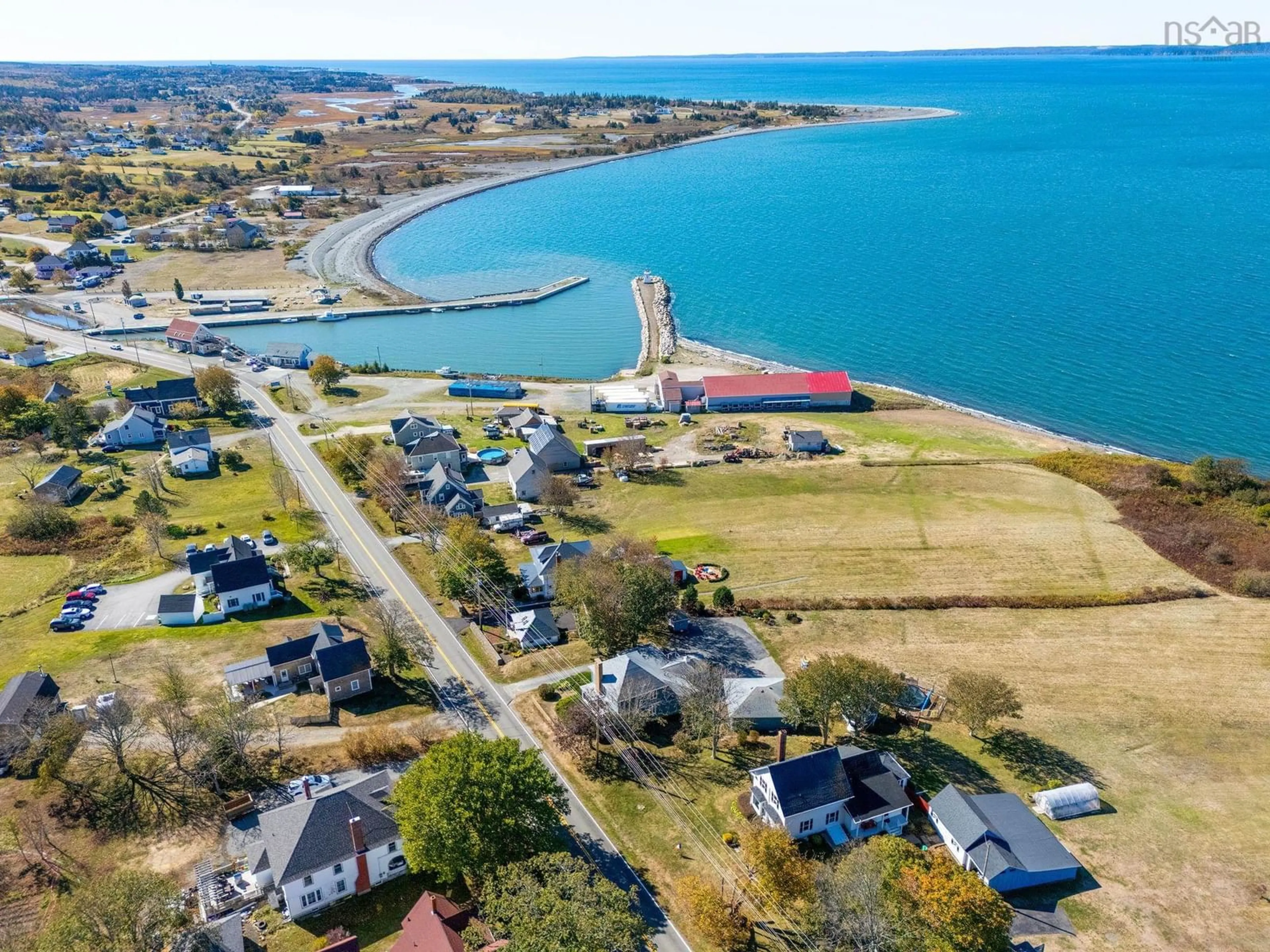 A pic from outside/outdoor area/front of a property/back of a property/a pic from drone, water/lake/river/ocean view for 3315 Highway 1, Belliveaus Cove Nova Scotia B0W 1J0