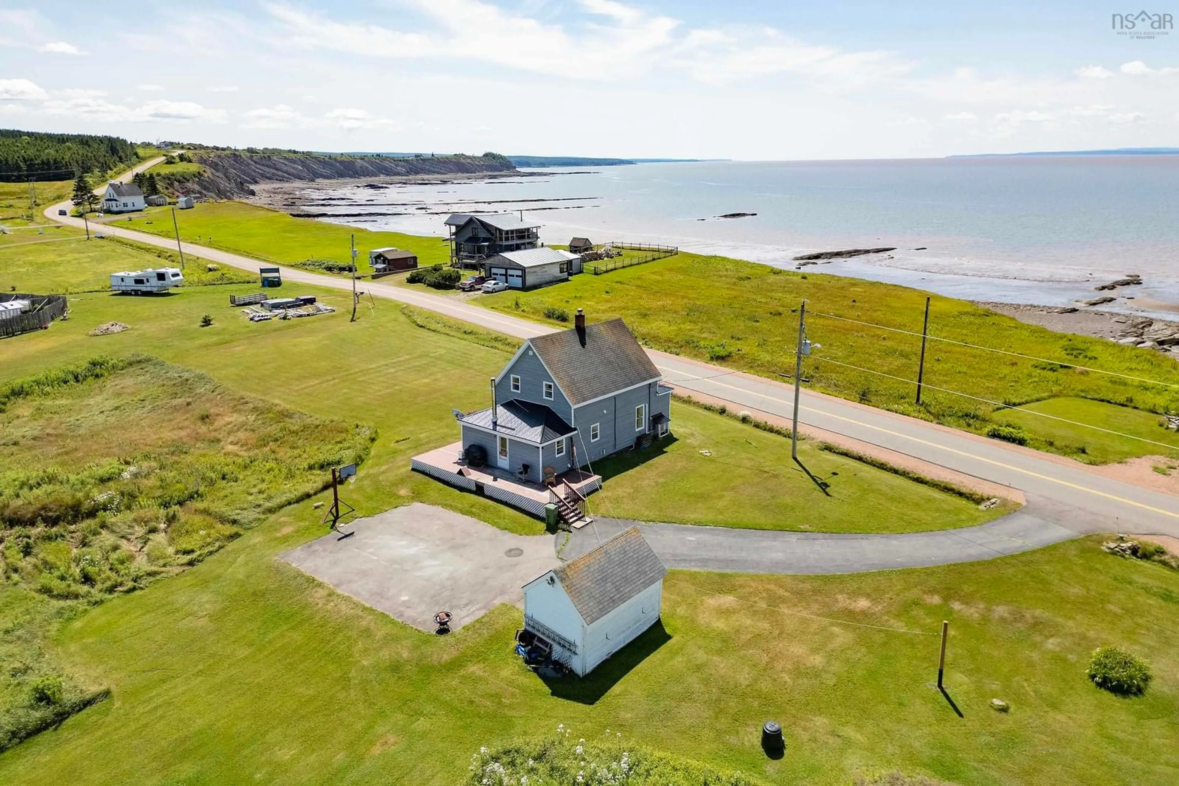 A pic from outside/outdoor area/front of a property/back of a property/a pic from drone, water/lake/river/ocean view for 516 Lower Cove Rd, Lower Cove Nova Scotia B0L 1A0