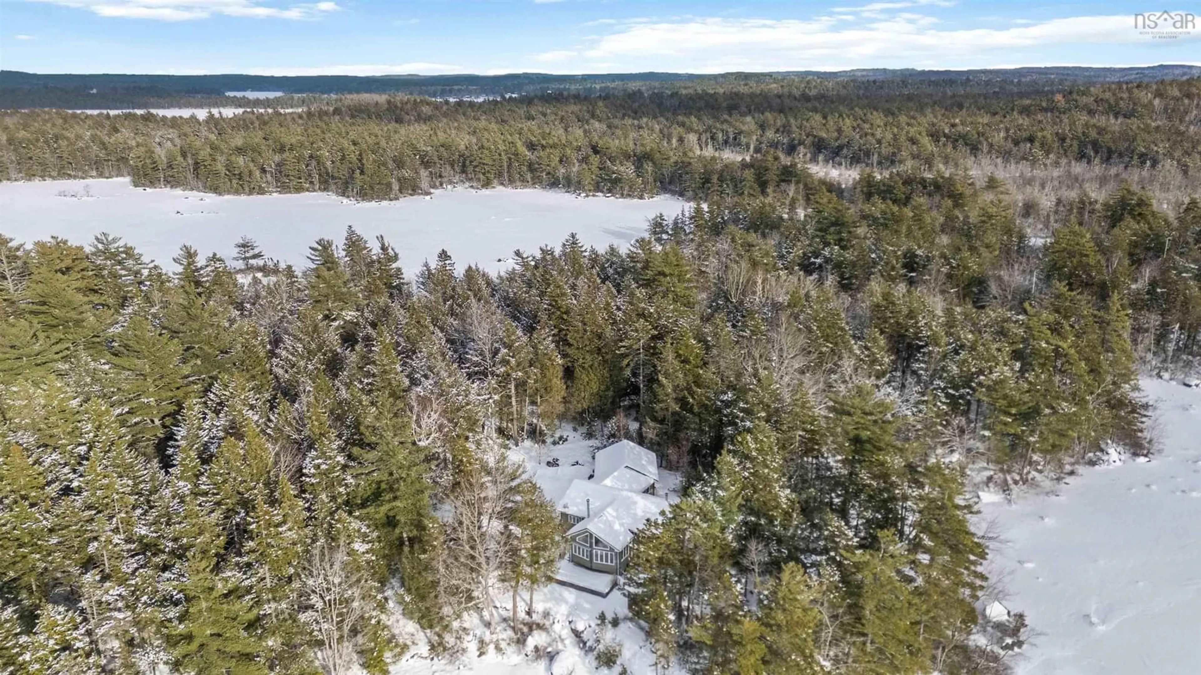 A pic from outside/outdoor area/front of a property/back of a property/a pic from drone, forest/trees view for 123 Deer Point Rd, Labelle Nova Scotia B0T 1E0