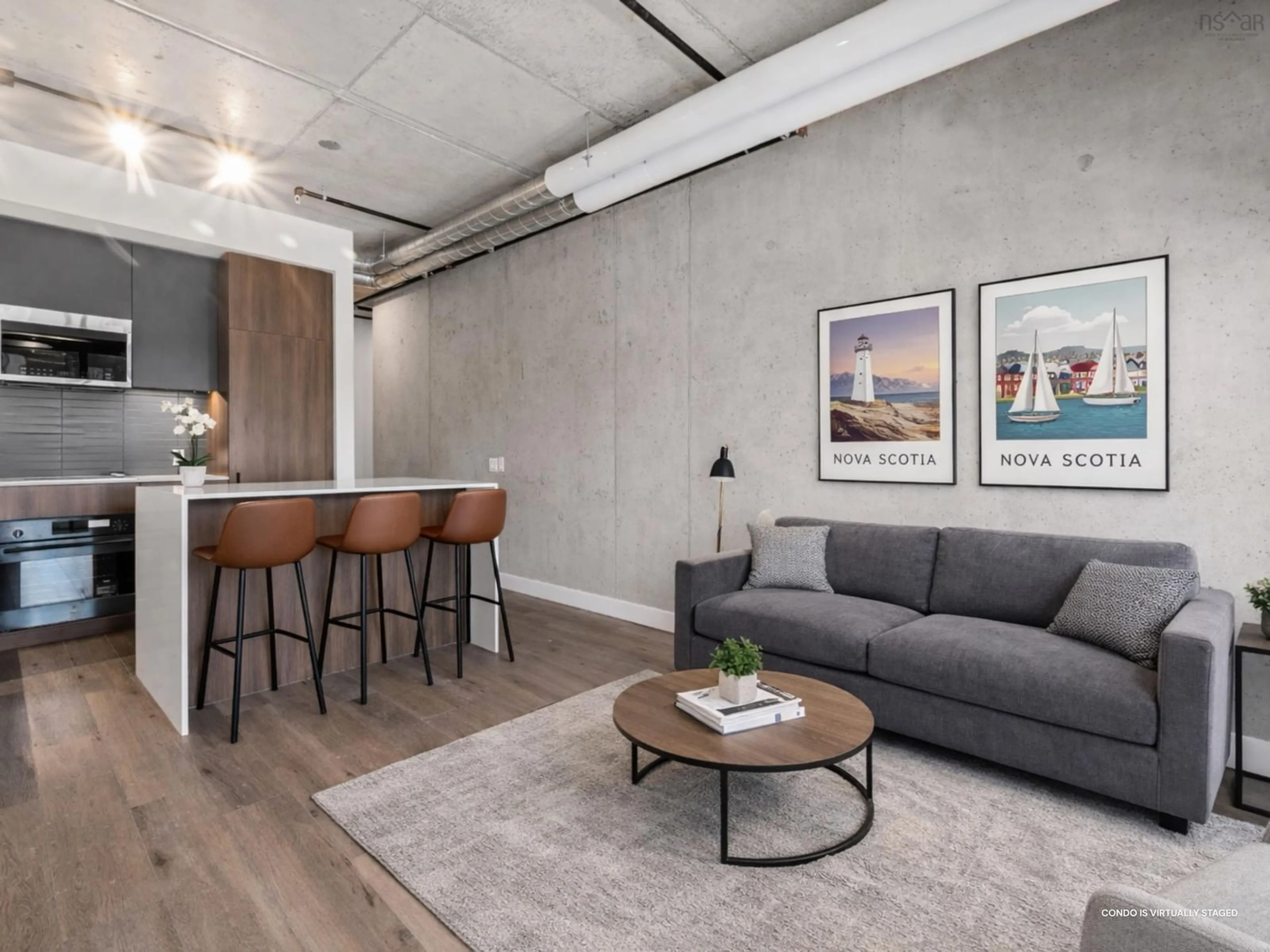 Living room with furniture, cement floor for 5511 Bilby St #606, Halifax Nova Scotia B3K 0M5