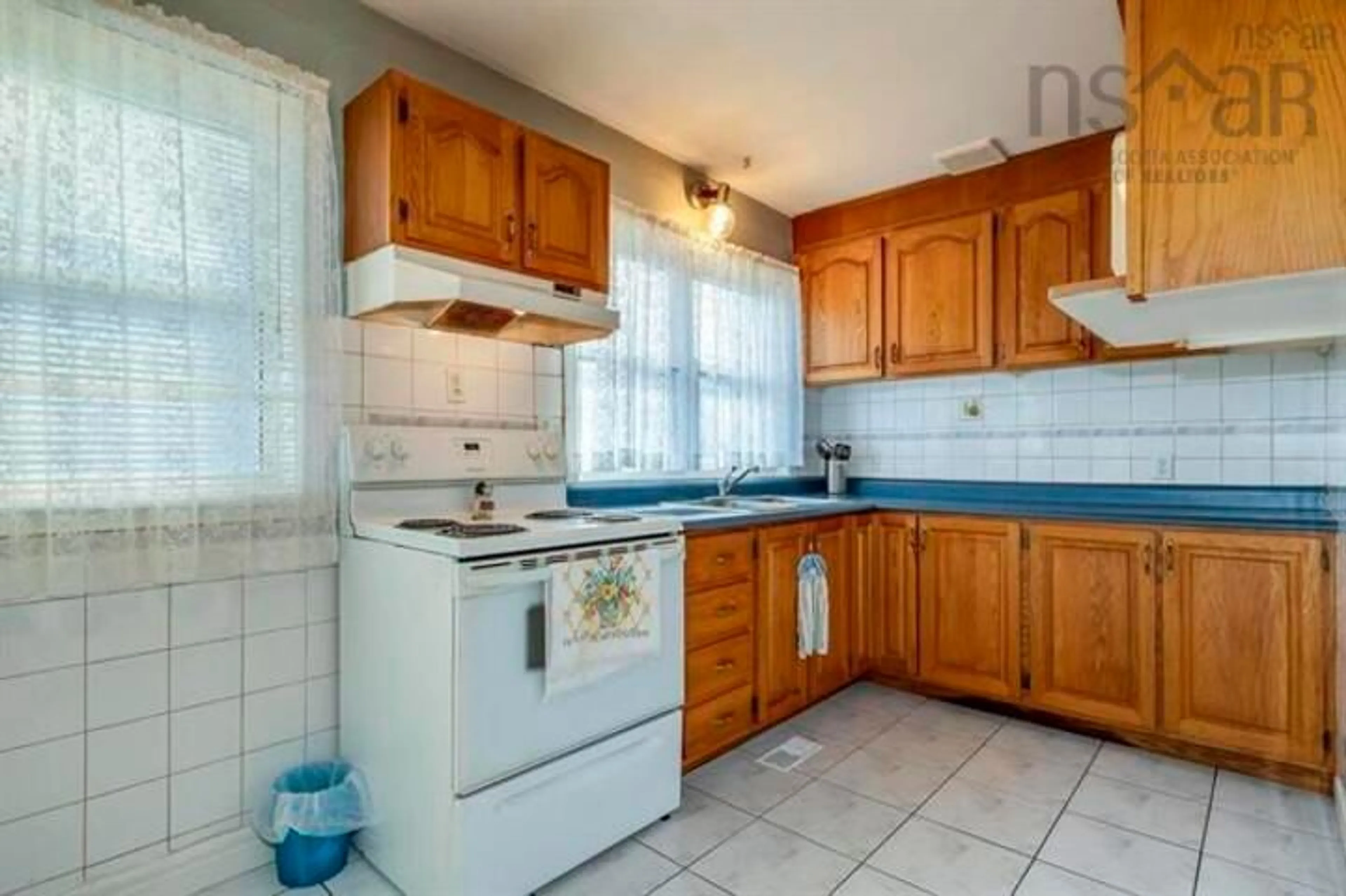 Standard kitchen, ceramic/tile floor for 60 Thornhill Dr, Spryfield Nova Scotia B3R 2B4