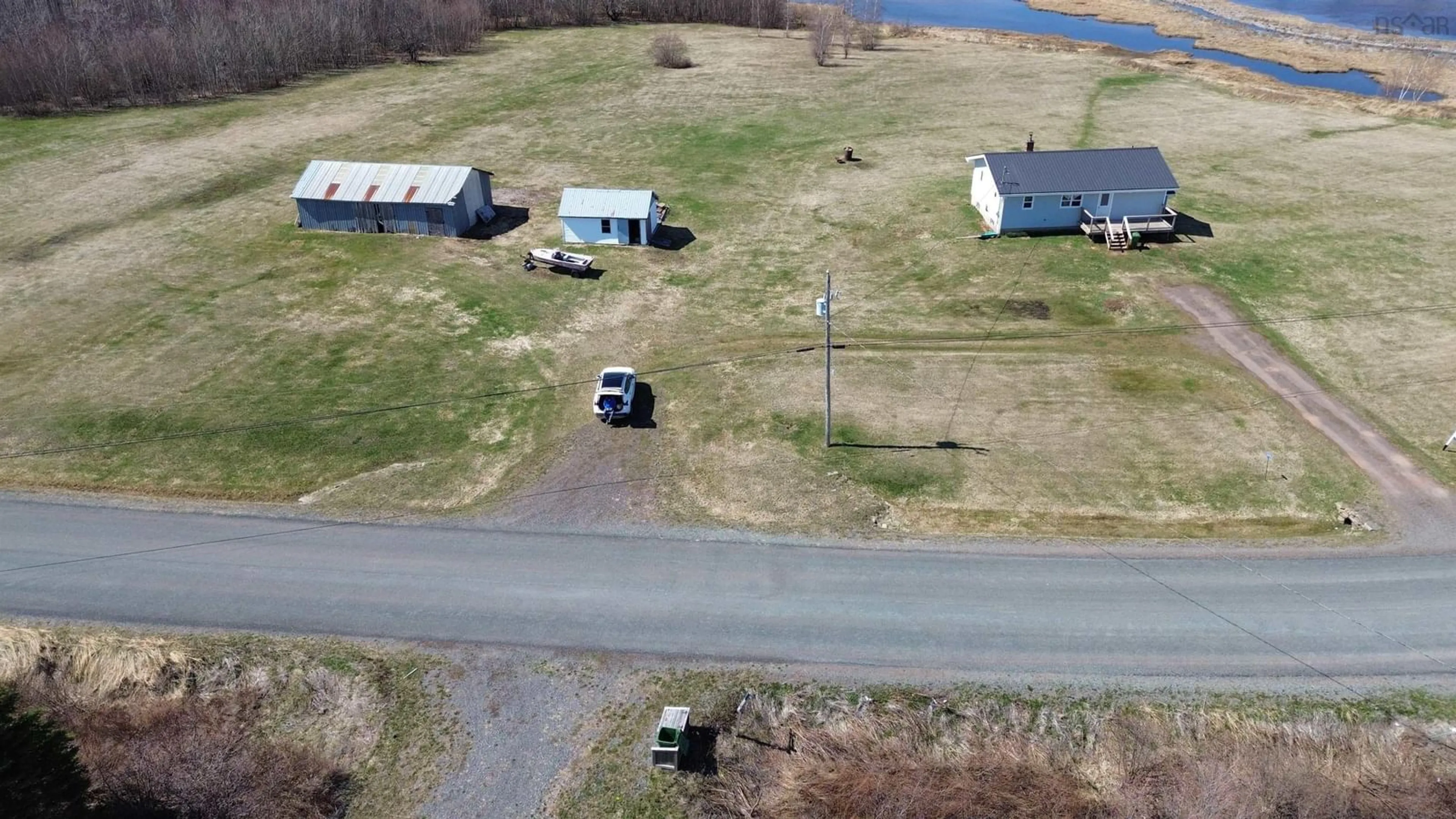 A pic from outside/outdoor area/front of a property/back of a property/a pic from drone, unknown for 3999 Malagash Rd, Malagash Point Nova Scotia B0K 1E0